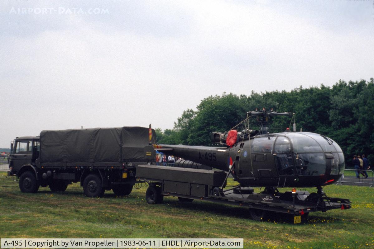 A-495, Sud SE-3160 Alouette III C/N 1495, Royal Netherlands Air Force Alouette III on a trailer behind an Dutch Army truck - Deelen Air Base Open Day 1983