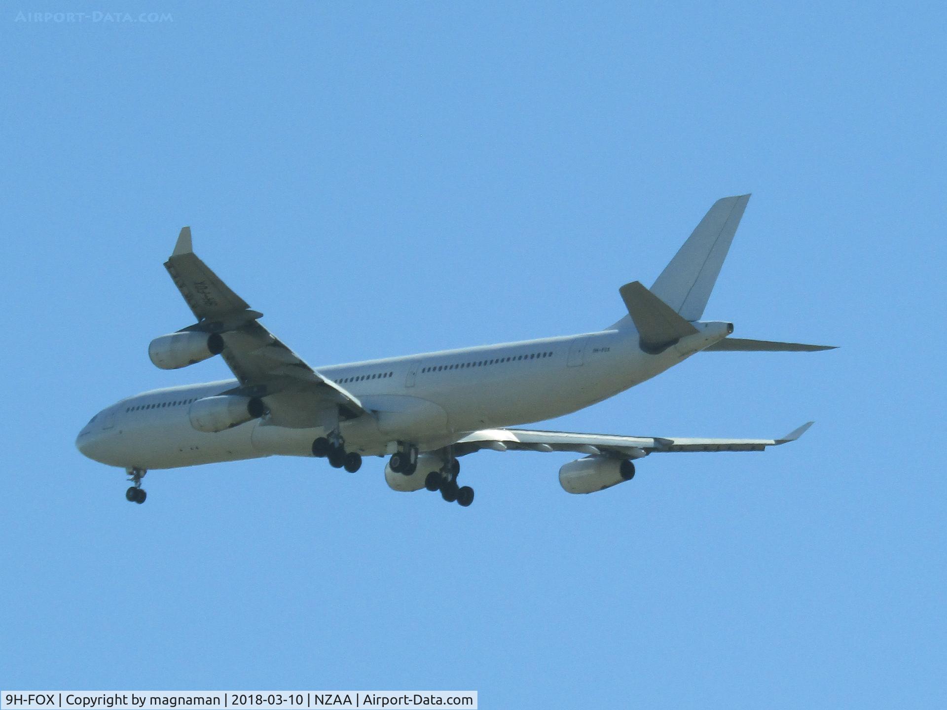 9H-FOX, 1997 Airbus A340-313 C/N 185, taken whilst parked at traffic lights through windscreen! Nearly at end of wet lease to Air NZ
