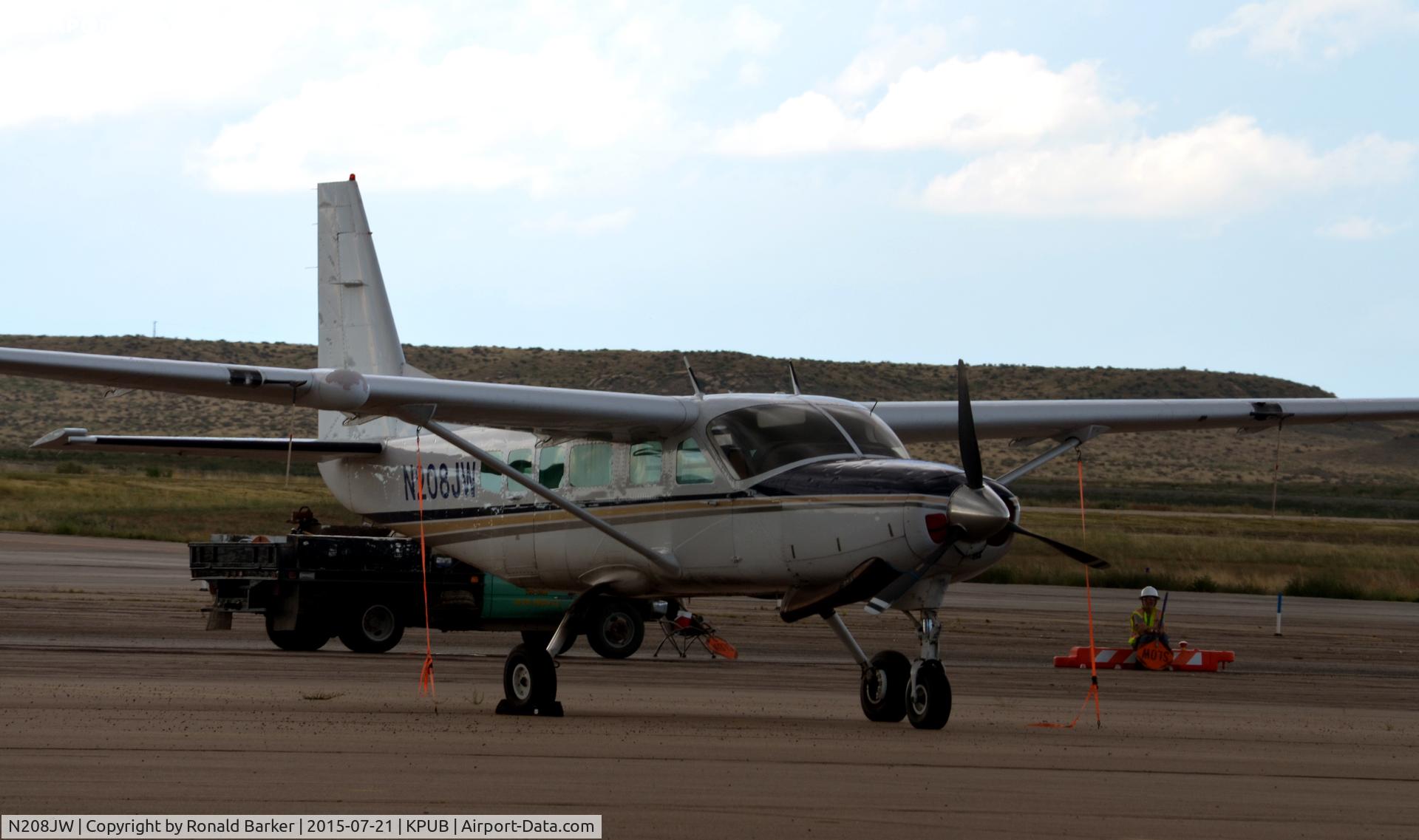 N208JW, 1989 Cessna 208 Caravan 1 C/N 20800166, On the ramp Pueblo