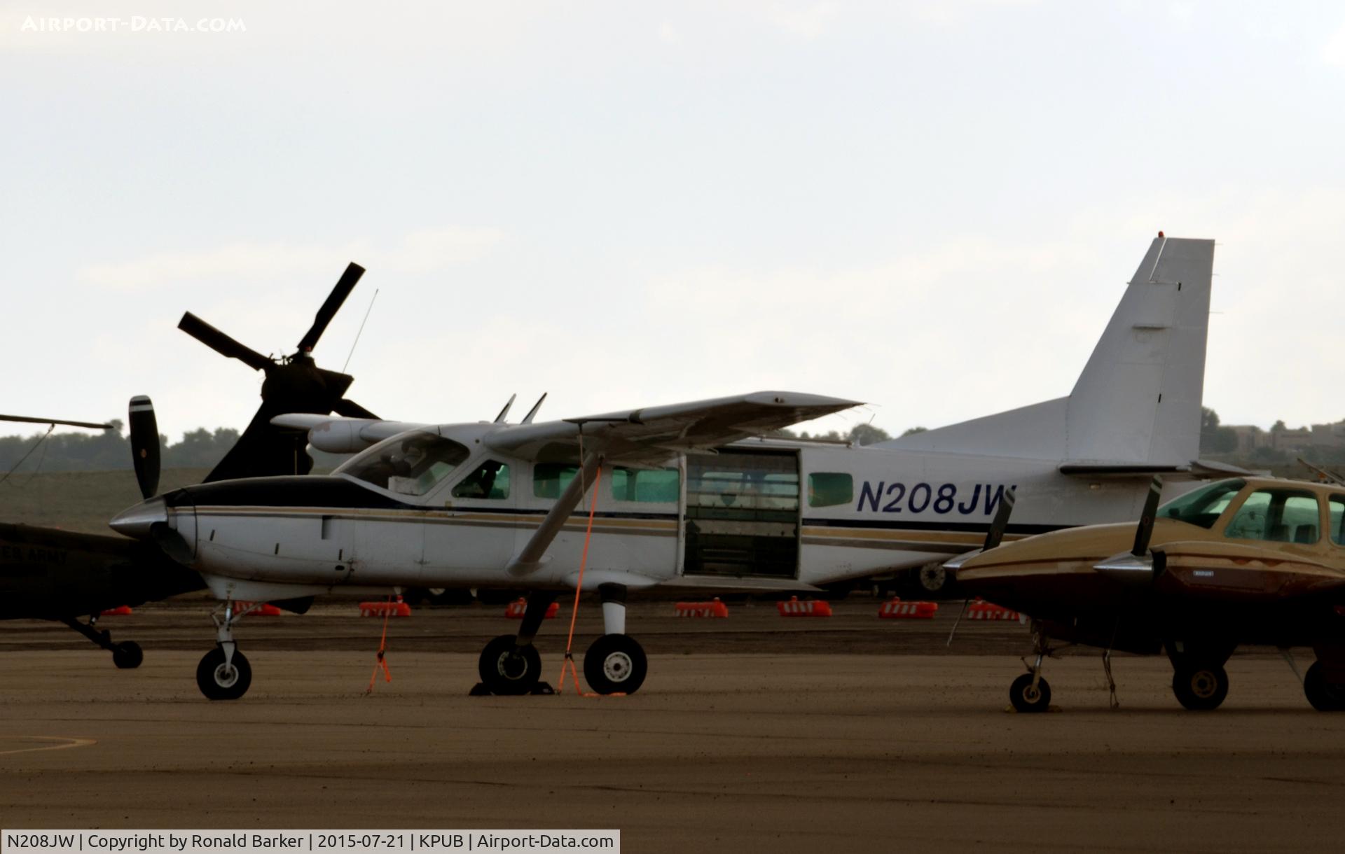 N208JW, 1989 Cessna 208 Caravan 1 C/N 20800166, On the ramp Pueblo