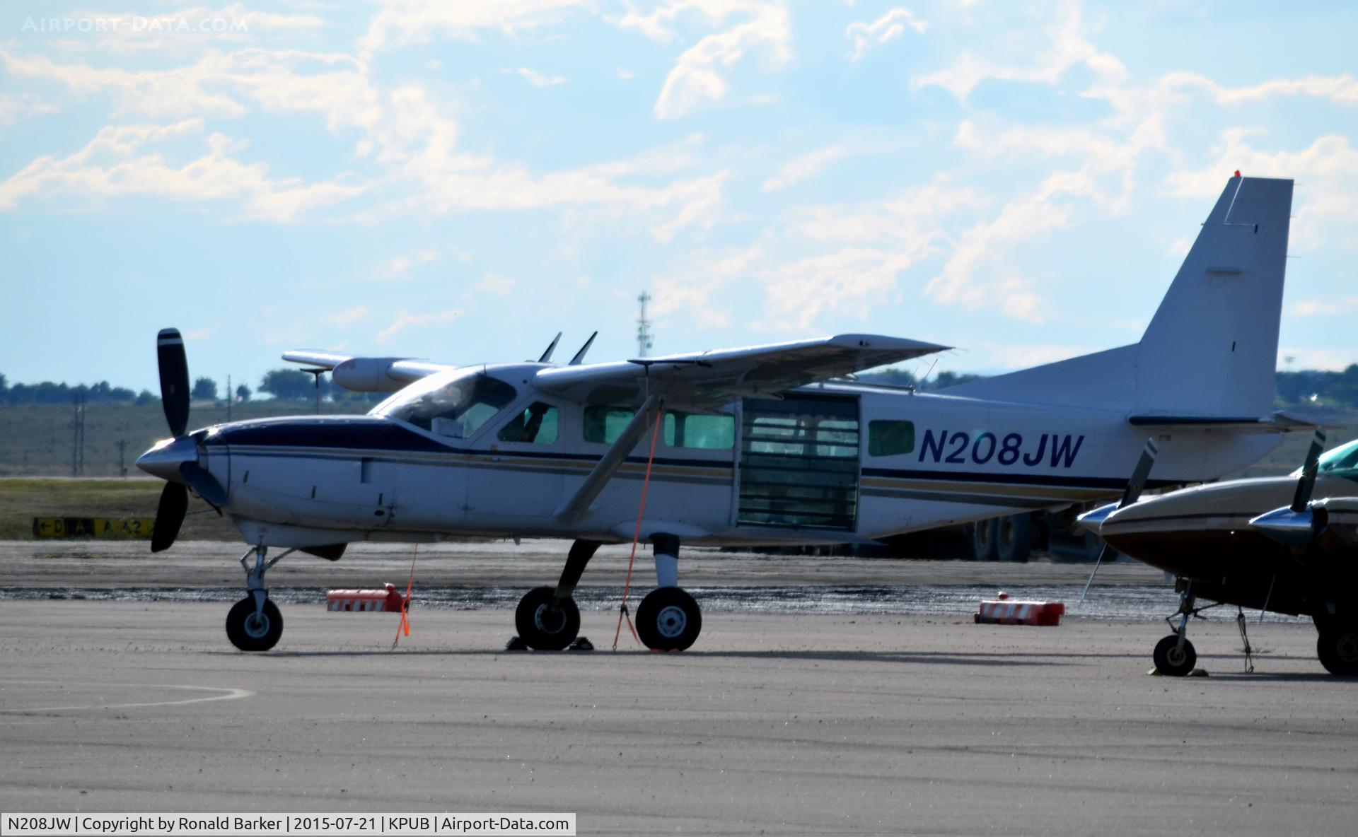 N208JW, 1989 Cessna 208 Caravan 1 C/N 20800166, On the ramp Pueblo