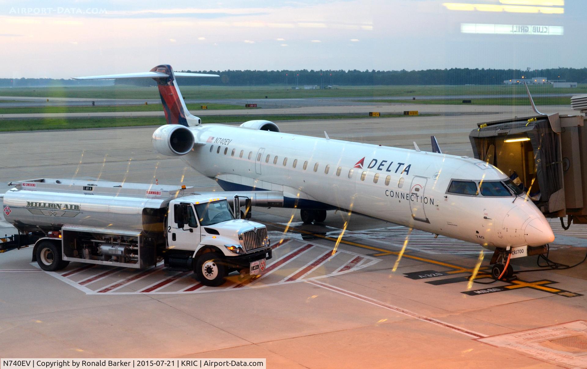 N740EV, 2004 Bombardier CRJ-701 (CL-600-2C10) Regional Jet C/N 10151, At the gate Richmond