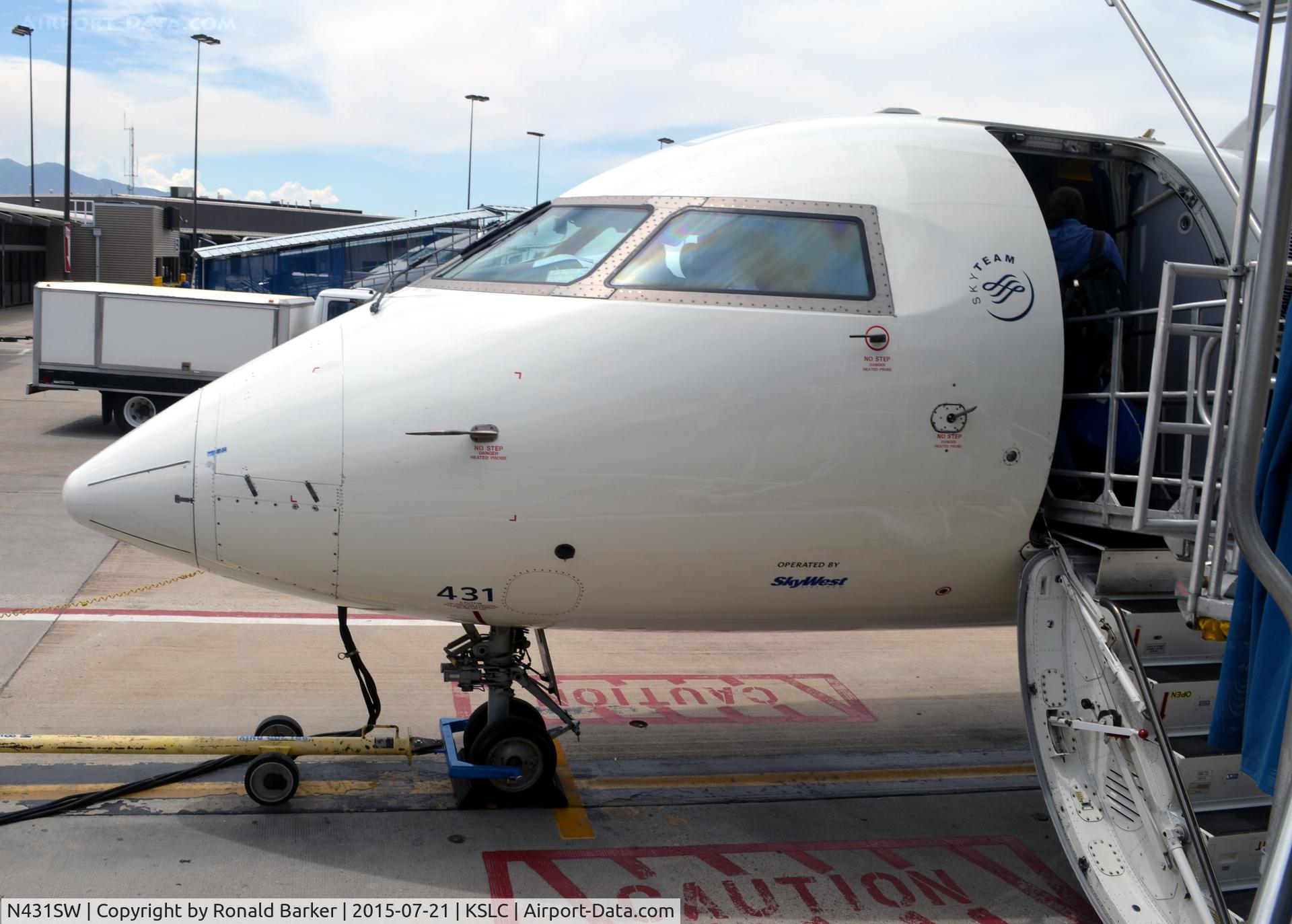 N431SW, 2001 Bombardier CRJ-200LR (CL-600-2B19) C/N 7536, Nose of aircraft at gate E1 SLC
