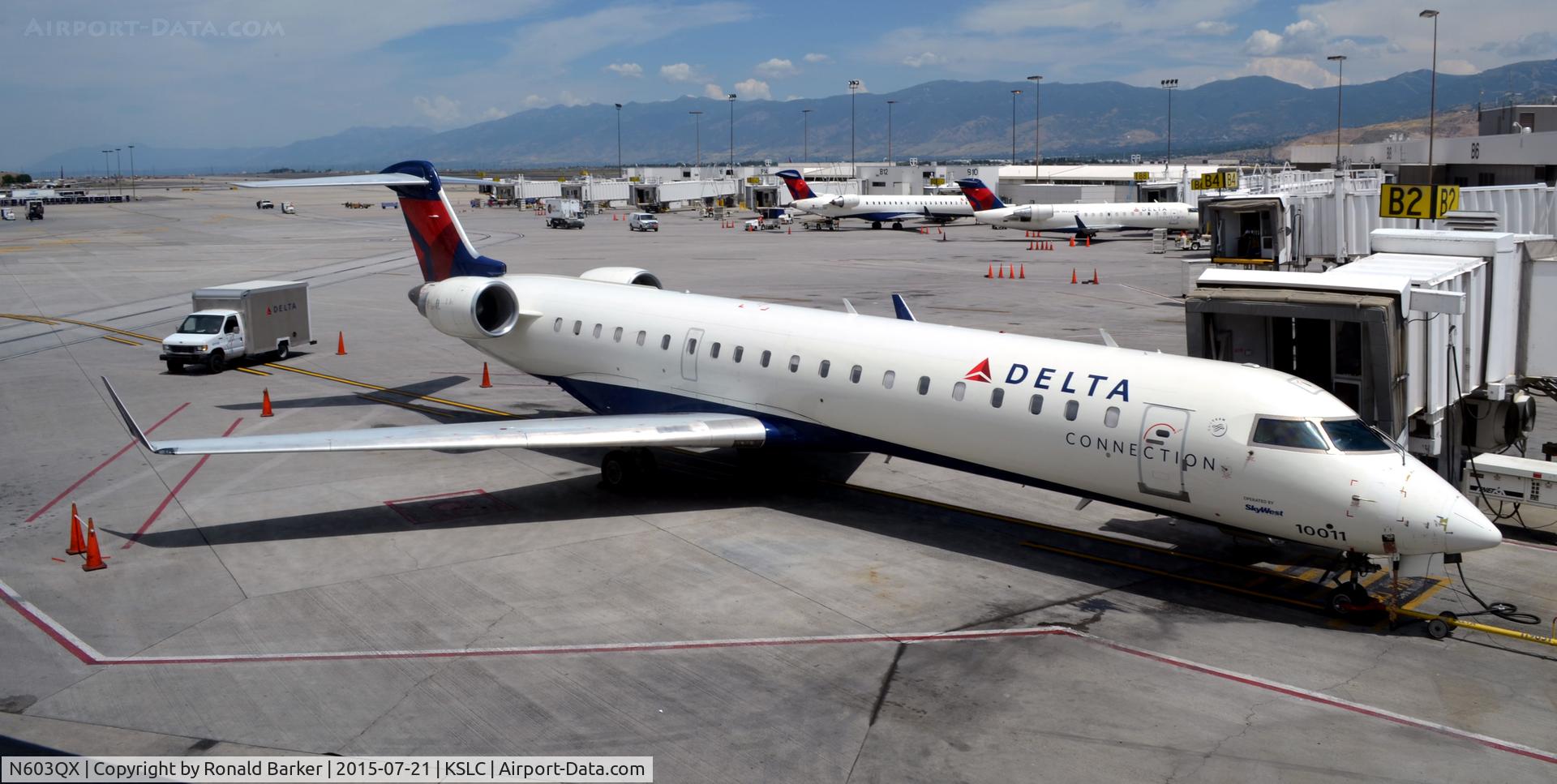 N603QX, 2001 Bombardier CRJ-550 C/N 10011, At the gate B21 SLC