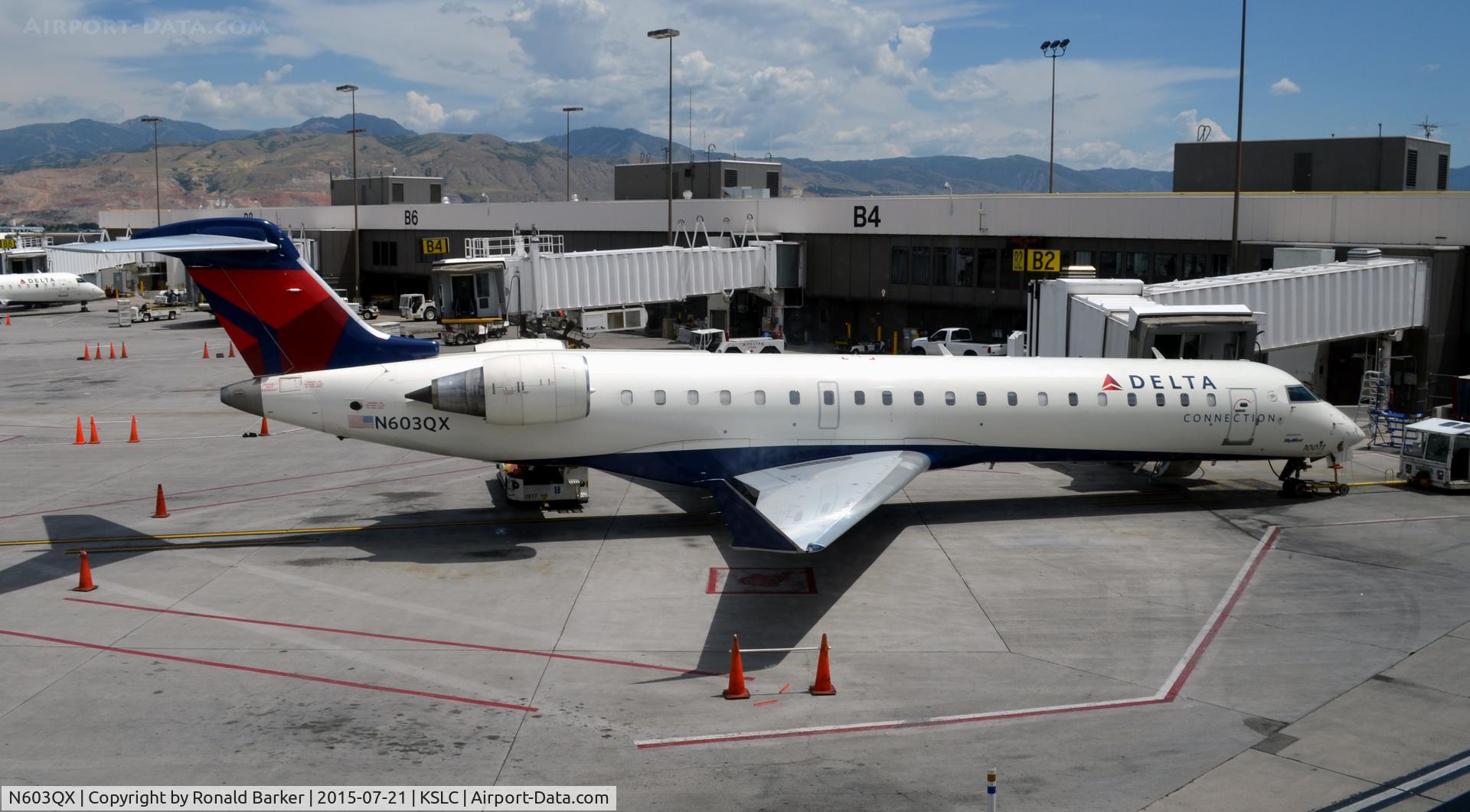N603QX, 2001 Bombardier CRJ-550 C/N 10011, At gate B21 SLC