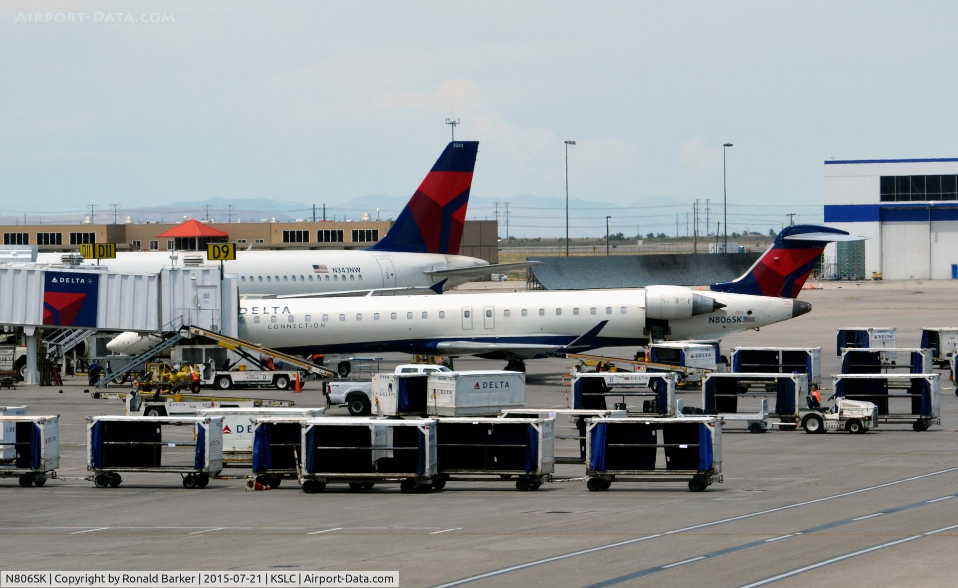 N806SK, 2006 Bombardier CRJ-900ER (CL-600-2D24) C/N 15070, At gate D9 SLC
