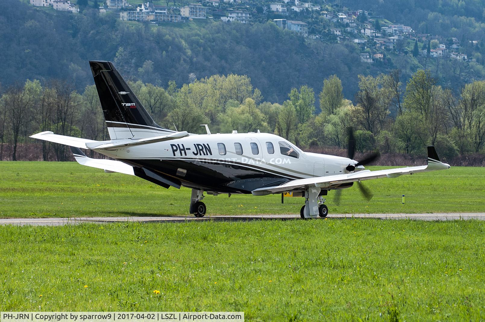 PH-JRN, 2014 Socata TBM-700N (TBM-900) C/N 1028, At Locarno-Magadino airport, civil side. Leaving.