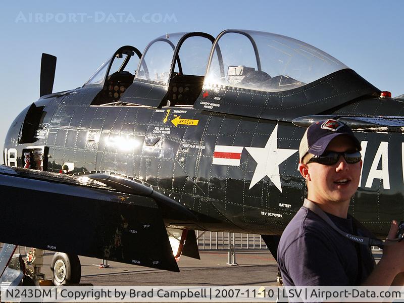 N243DM, 1957 North American T-28C Trojan C/N 226-239 (140662), My son John at Aviation Nation 2007. N243DM Trojan in background.