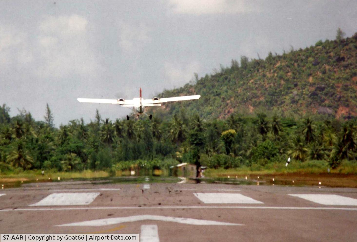 S7-AAR, 1977 De Havilland Canada DHC-6-310 Twin Otter C/N 539, Climbing out of Praslin, Seychelles  March 1989