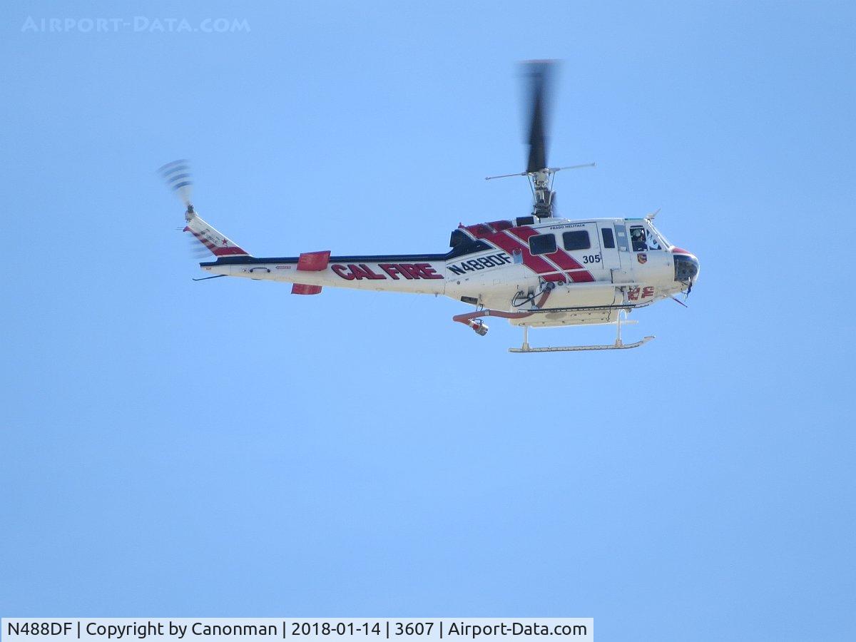 N488DF, 1969 Bell UH-1H-BF Iroquois C/N 11527, Passing over