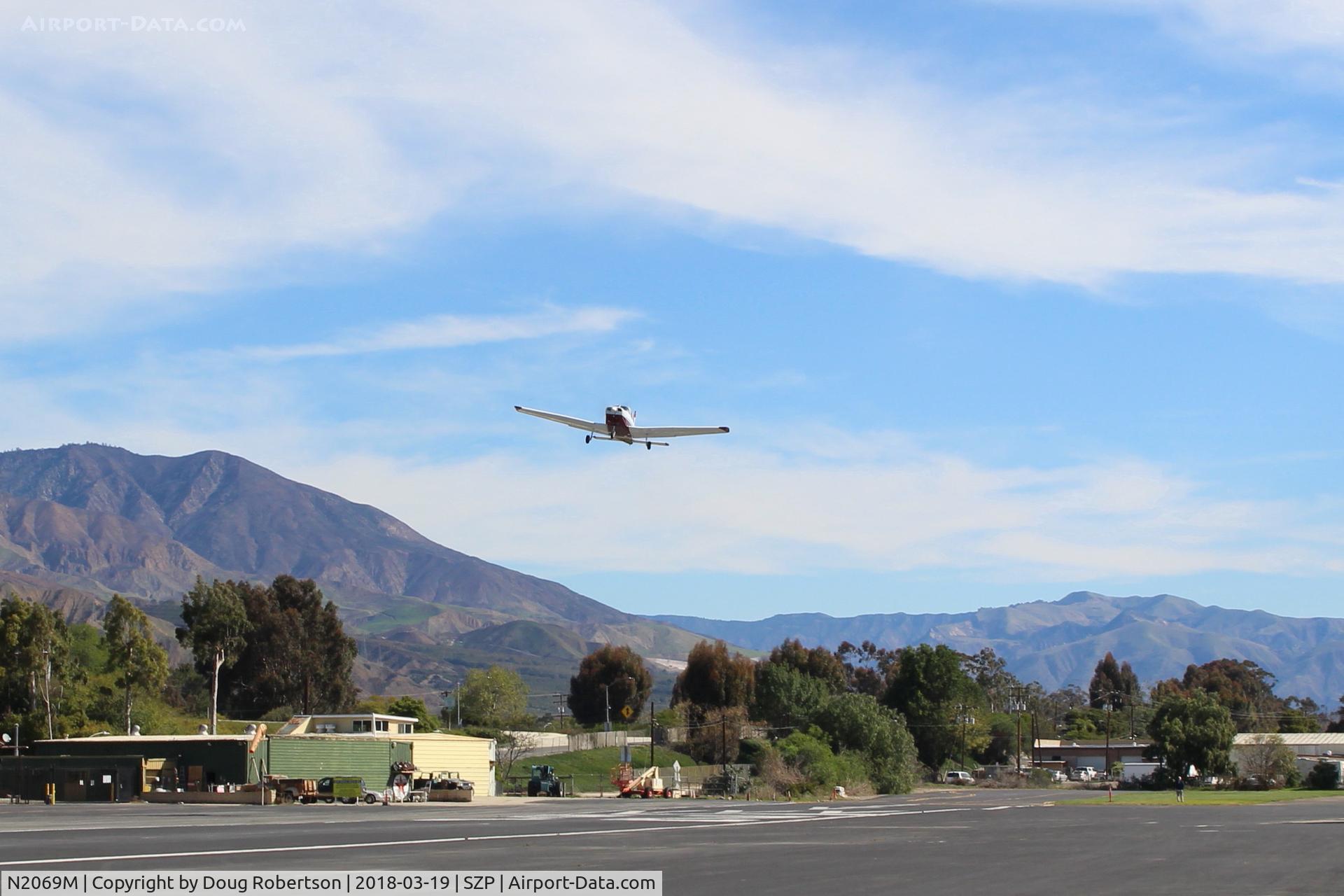 N2069M, Piper PA-28-161 Warrior II C/N 28-7816247, 1978 Piper PA-28-161 WARRIOR II, Lycoming O-320-D3G 160 Hp, flyover Rwy 22 despite strong Santana wind. Note windsock! SZP Tetrahedron and American flag confirmatory!,