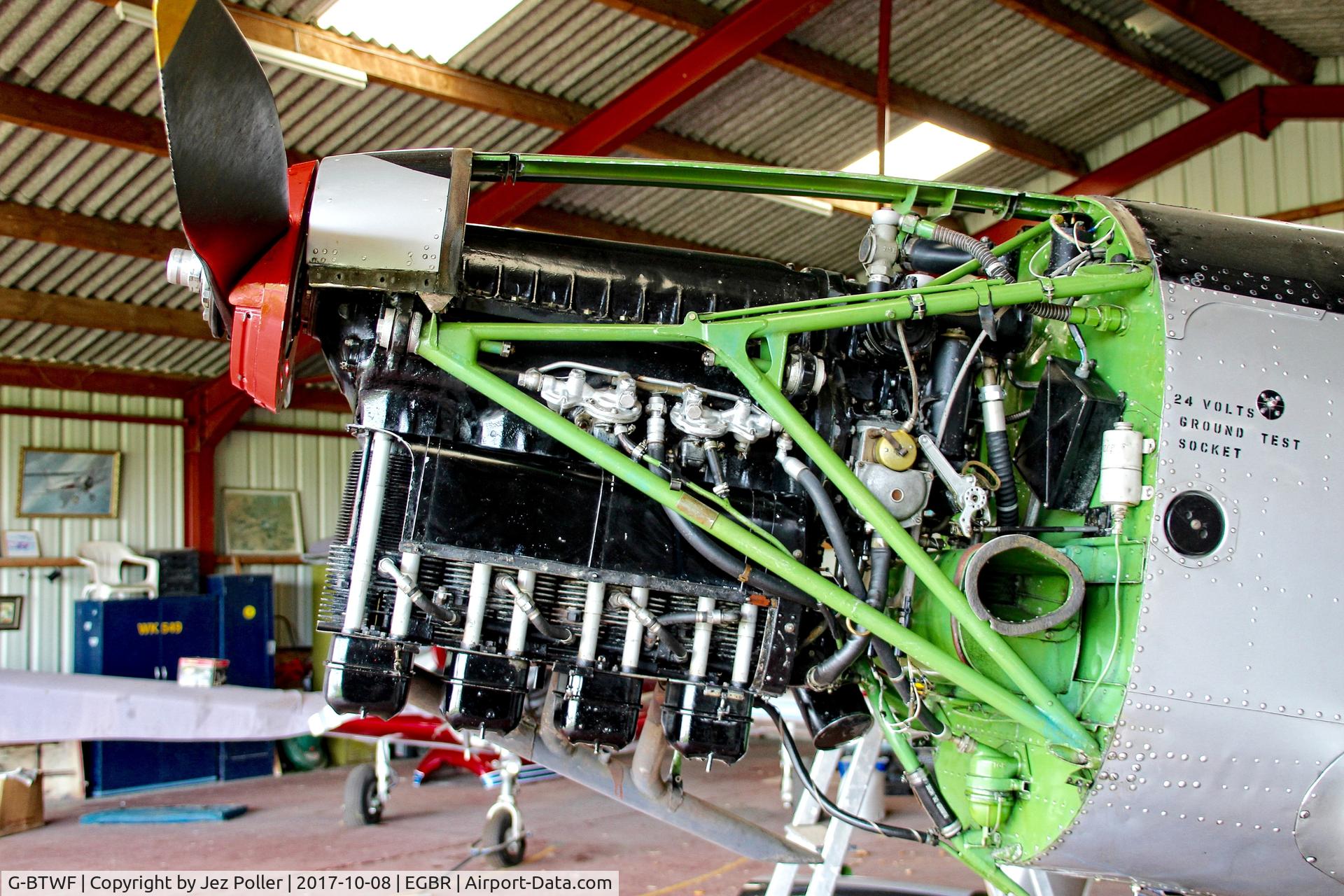G-BTWF, 1951 De Havilland DHC-1 Chipmunk T.10 C/N C1/0564, in hanger for maintenence, with cowlings removed the upside-down Gipsy Major engine is seen in all its glory!