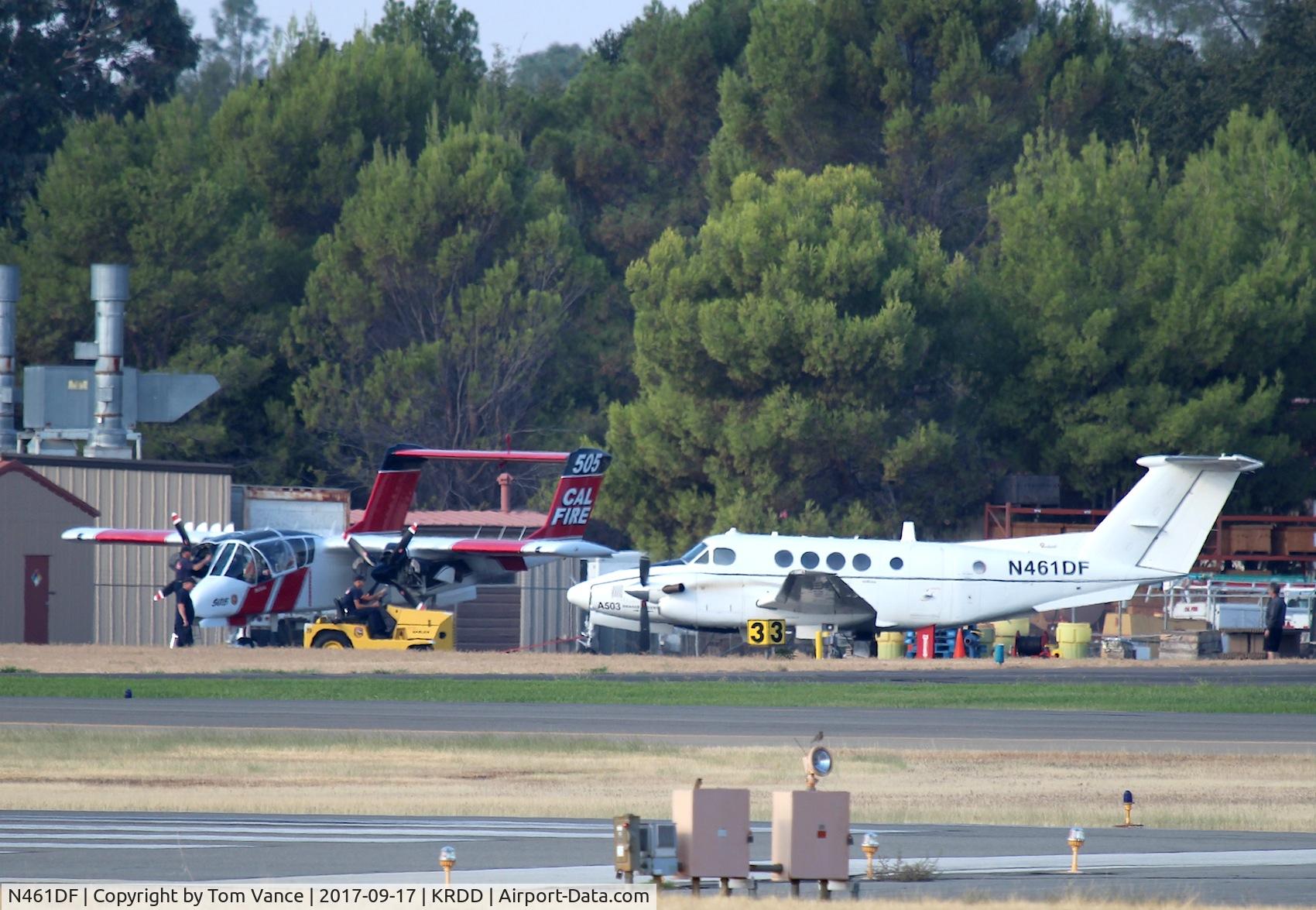 N461DF, 1981 Beech C-12D-1 Huron C/N BP-029, Ar Redding,CA USFS/USDA Air Tanker Base Beech C-12 being moved over towards the ramp for the daily flights during fire season.