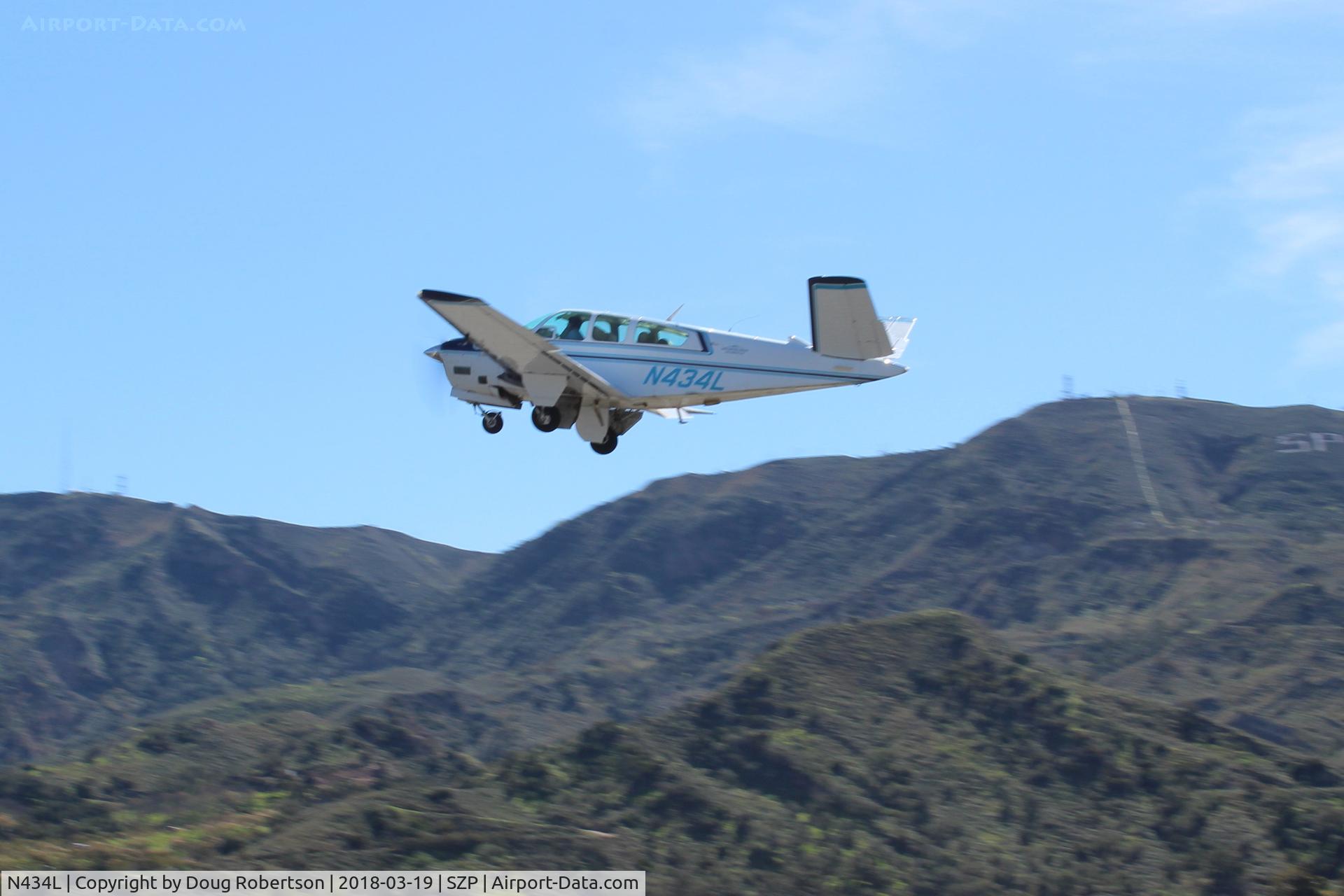 N434L, 1968 Beech V35A Bonanza C/N D-8694, 19968 Beech V35A BONANZA, Continental IO-520 285 Hp, takeoff climb Rwy 04, gear coming up.