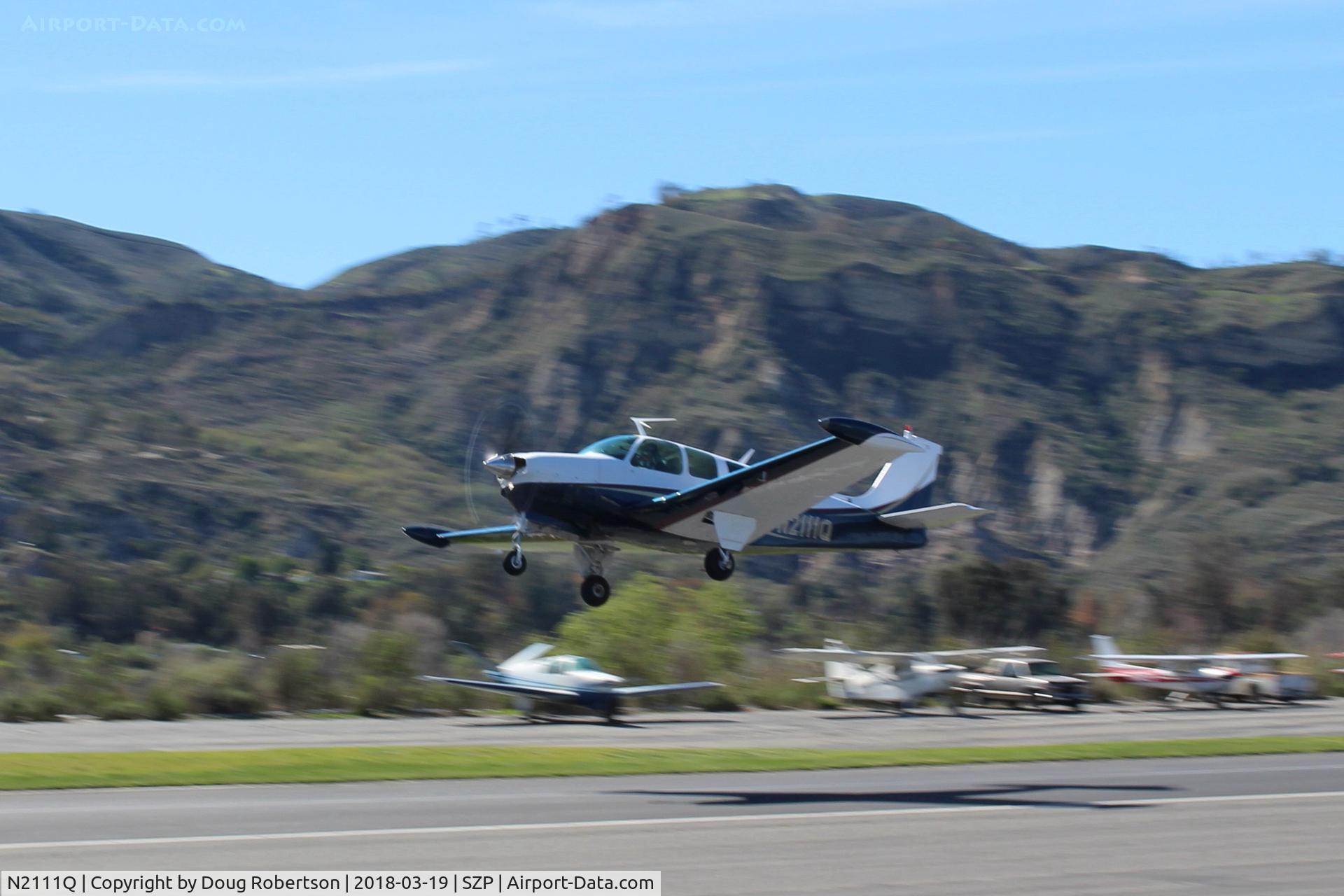N2111Q, 1969 Beech 36 Bonanza C/N E-135, 1969 Beech 36 BONANZA, Continental IO-550 300 Hp upgrade, takeoff climb Rwy 04. My 2008 OSH AirVenture ride & beyond-4,000 mile trip. CMA-based. See more photos.