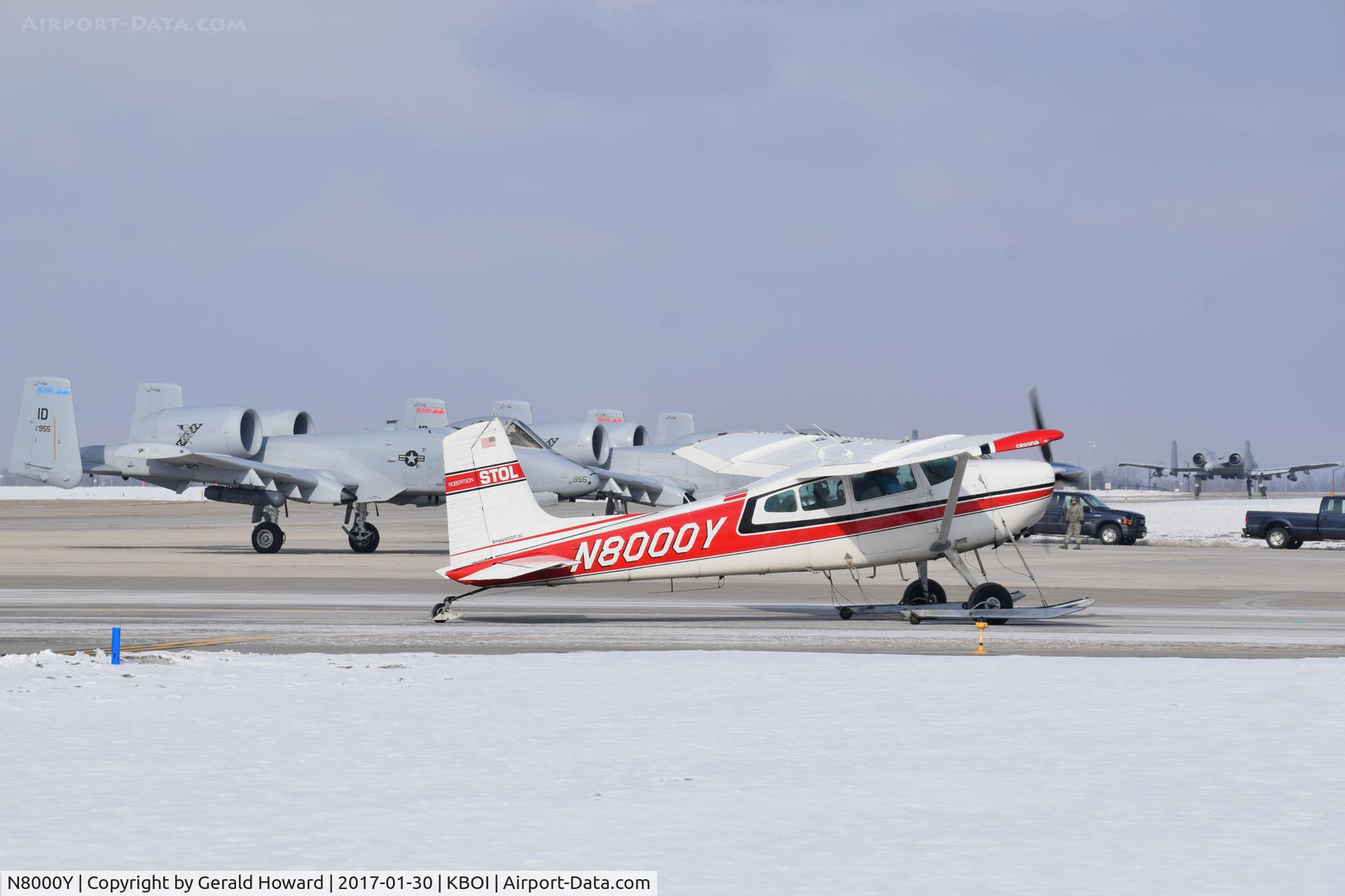 N8000Y, 1973 Cessna 180J C/N 18052391, Taxiing between the the A-10s.