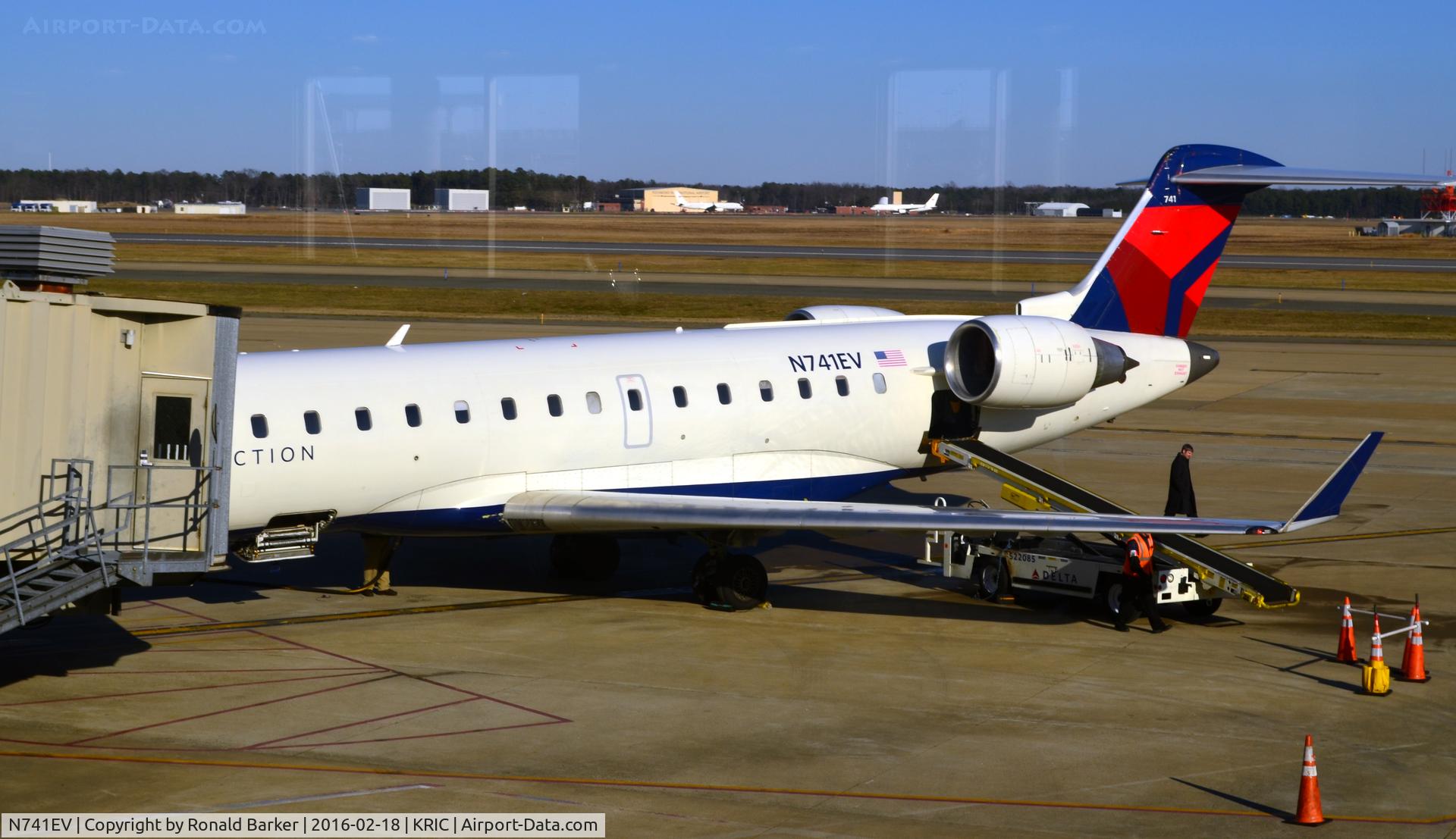 N741EV, 2004 Bombardier CRJ-701ER (CL-600-2C10) Regional Jet C/N 10155, At the gate Richmond