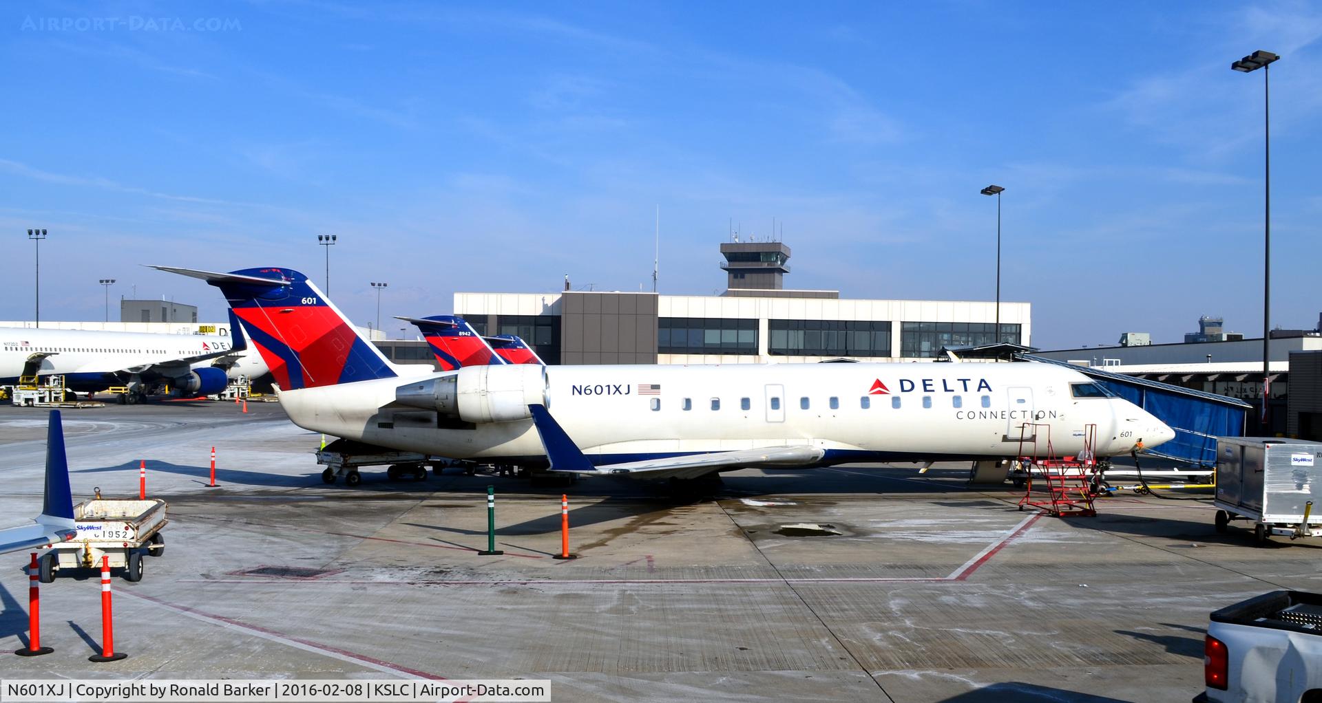 N601XJ, 2005 Bombardier CRJ-200 (CL-600-2B19) C/N 8044, At the gate SLC