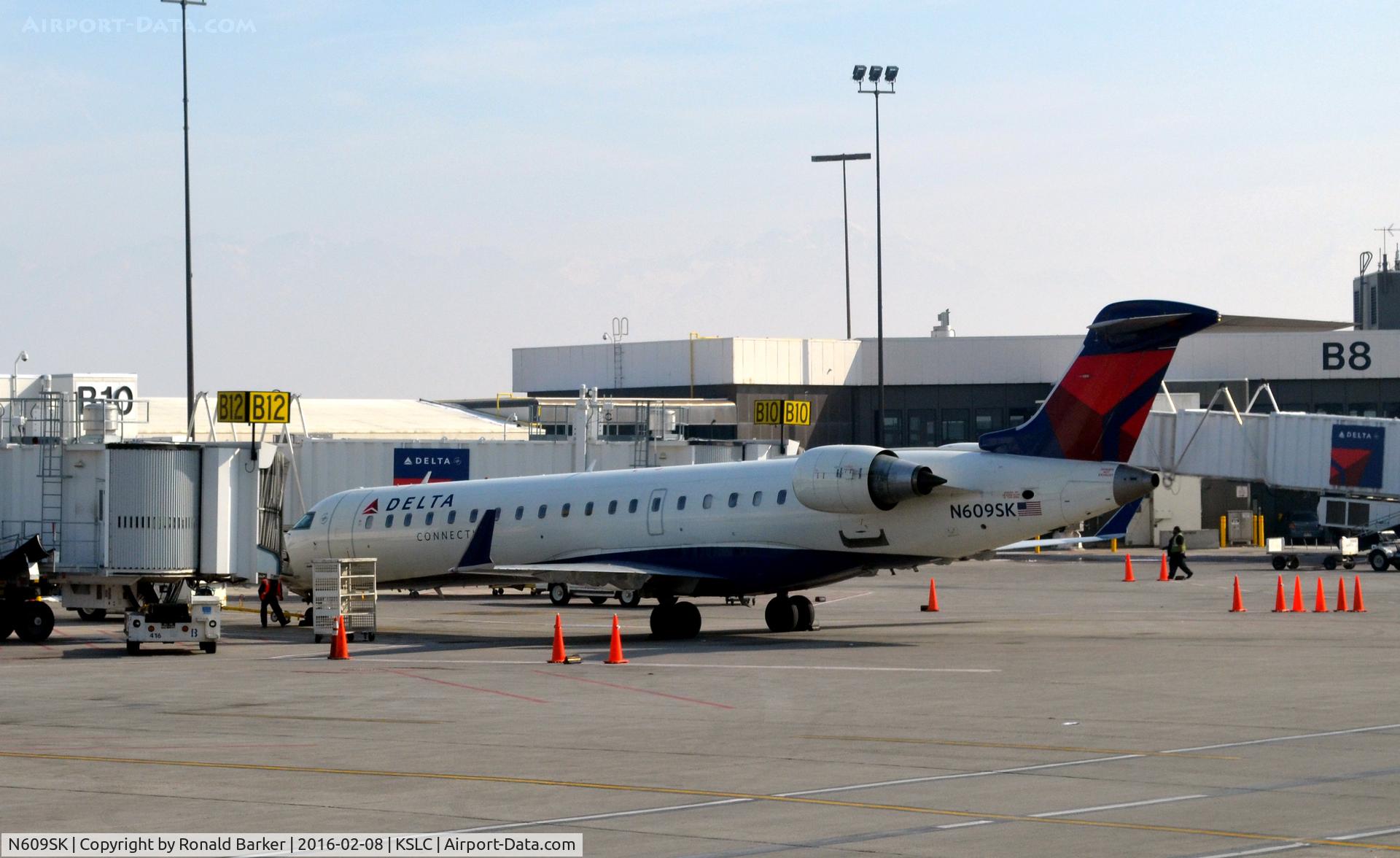 N609SK, 2002 Bombardier CRJ-701 (CL-600-2C10) Regional Jet C/N 10020, Gate B12 SLC