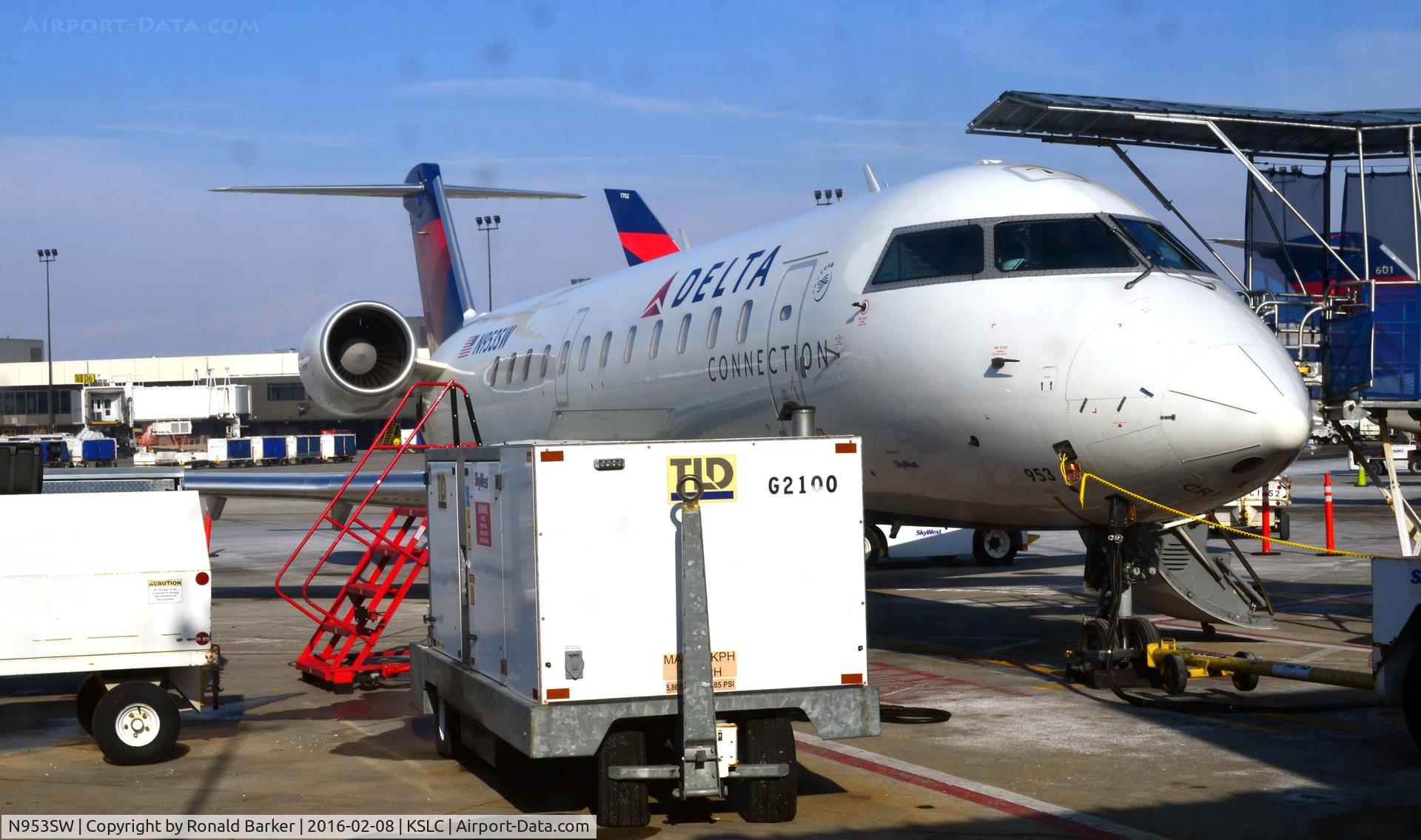 N953SW, 2003 Bombardier CRJ-200LR (CL-600-2B19) C/N 7813, At the gate SLC