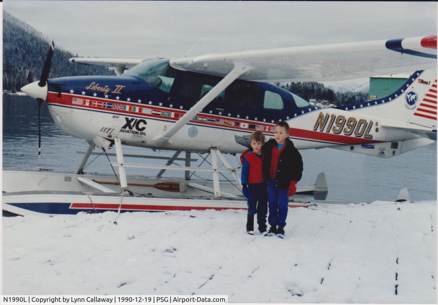 N1990L, Beech B19 Sport 150 C/N MB804, Tom Casey went around the world with this float plane (Notice all the country decals on the side of it) On his last leg, he made a stop in Petersburg, AK in December 1990. Our 2 boys, Brad and David, had to go check it out.