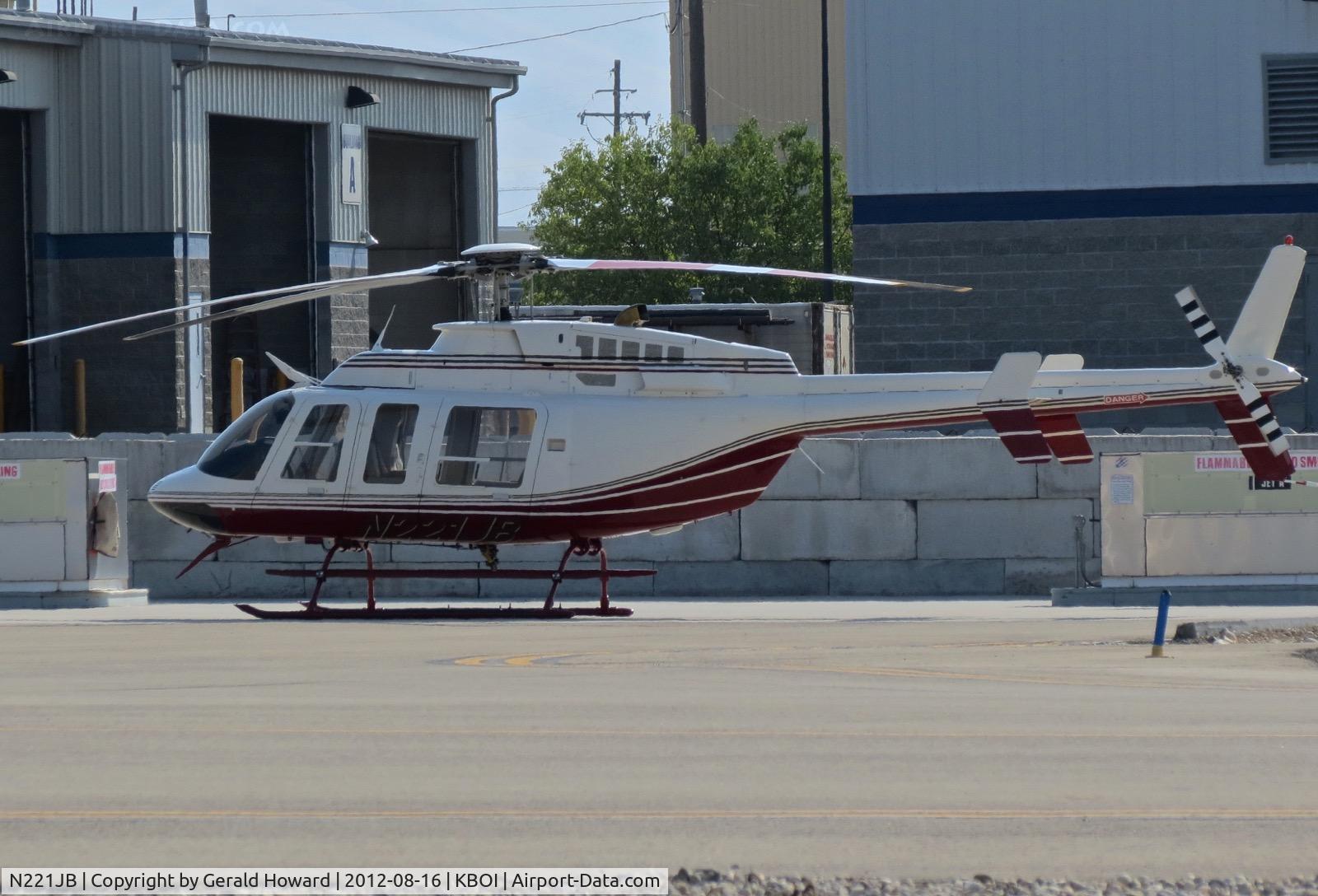 N221JB, 1997 Bell 407 C/N 53122, Parked on northeast side of field.