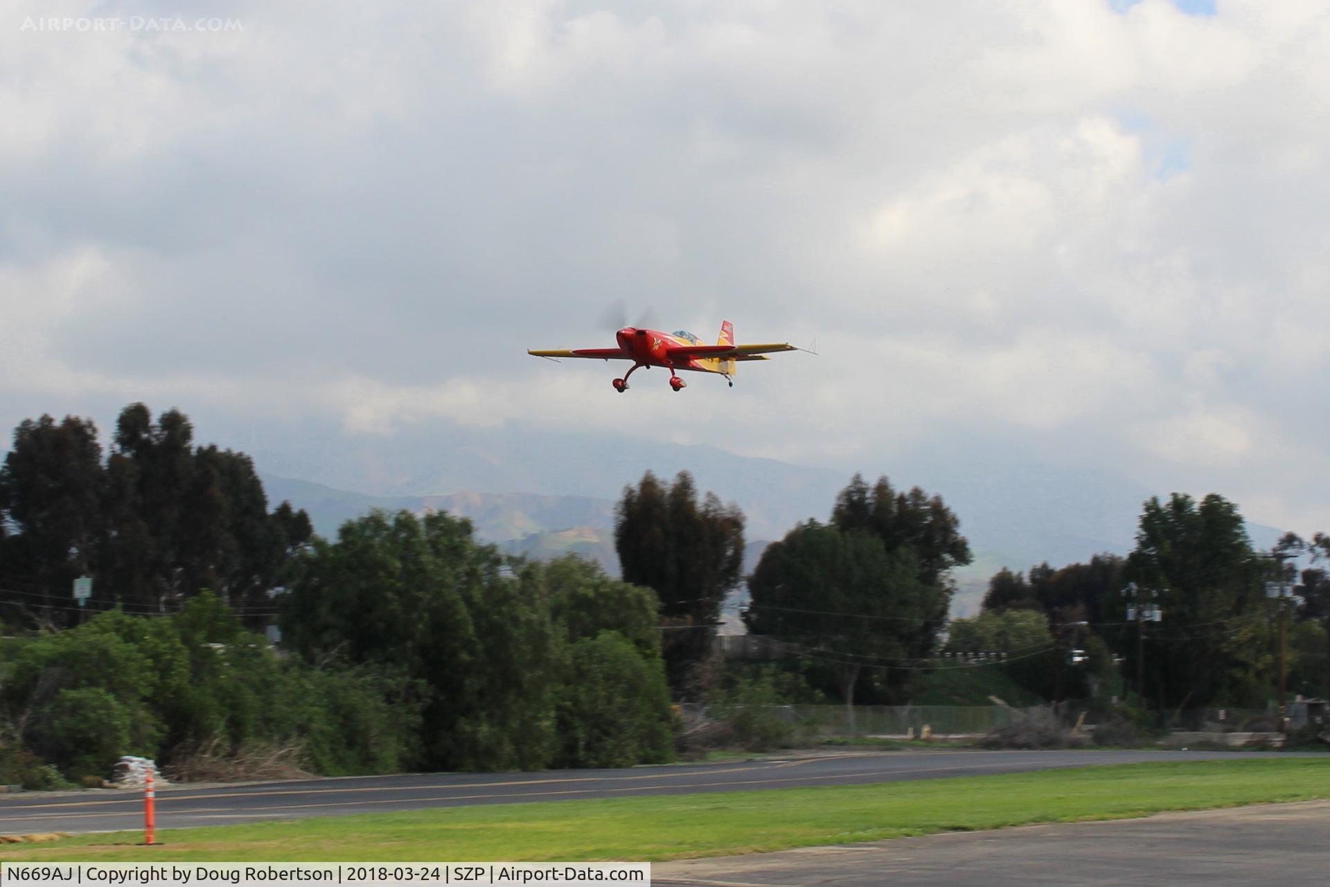 N669AJ, Extra EA-330SC C/N SC001E, Extraflugzeugbauproduktions EA330/SC, Lycoming IO-540-L1B5 300 Hp modified to 330 Hp? on final Rwy 22, Experimental class