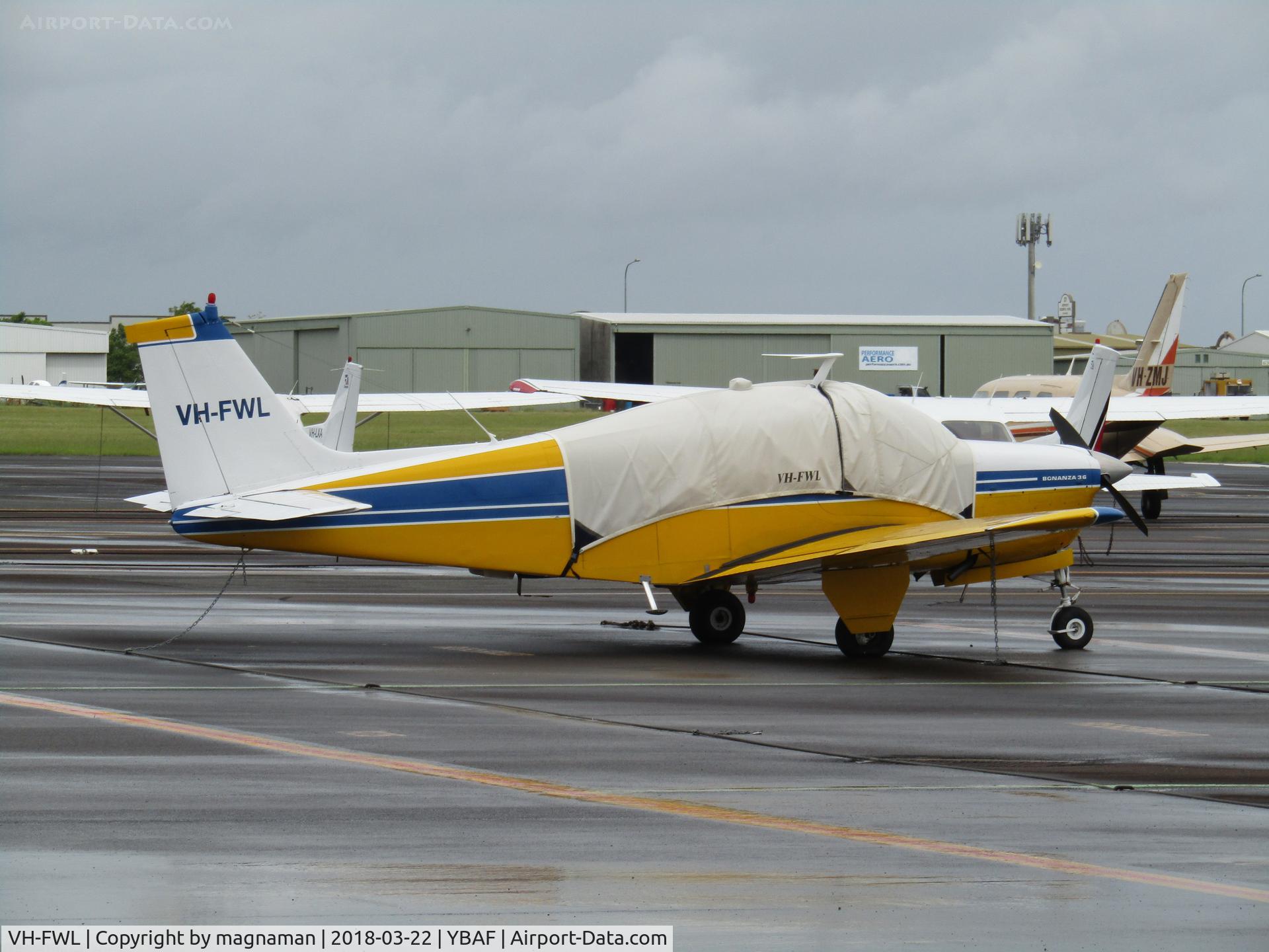 VH-FWL, 1968 Beech 36 Bonanza C/N E-89, on damp apron