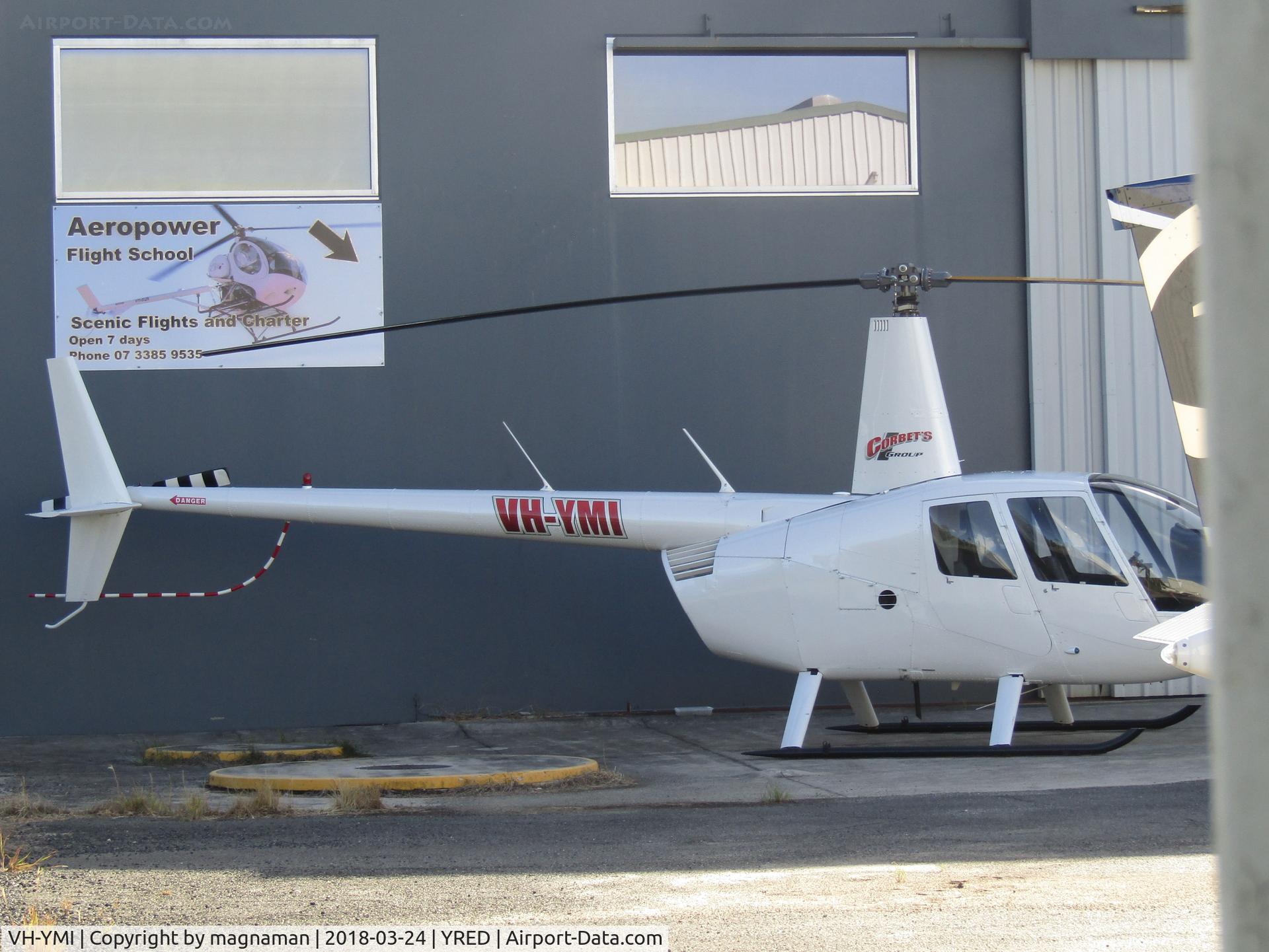 VH-YMI, 2003 Robinson R44 II C/N 10238, hiding around corner