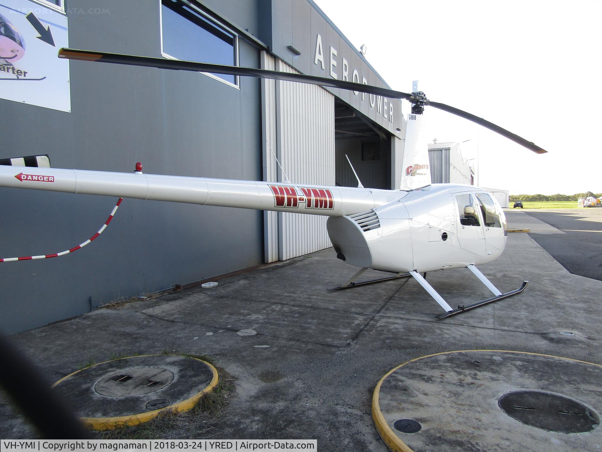 VH-YMI, 2003 Robinson R44 II C/N 10238, at redcliffe between hangars