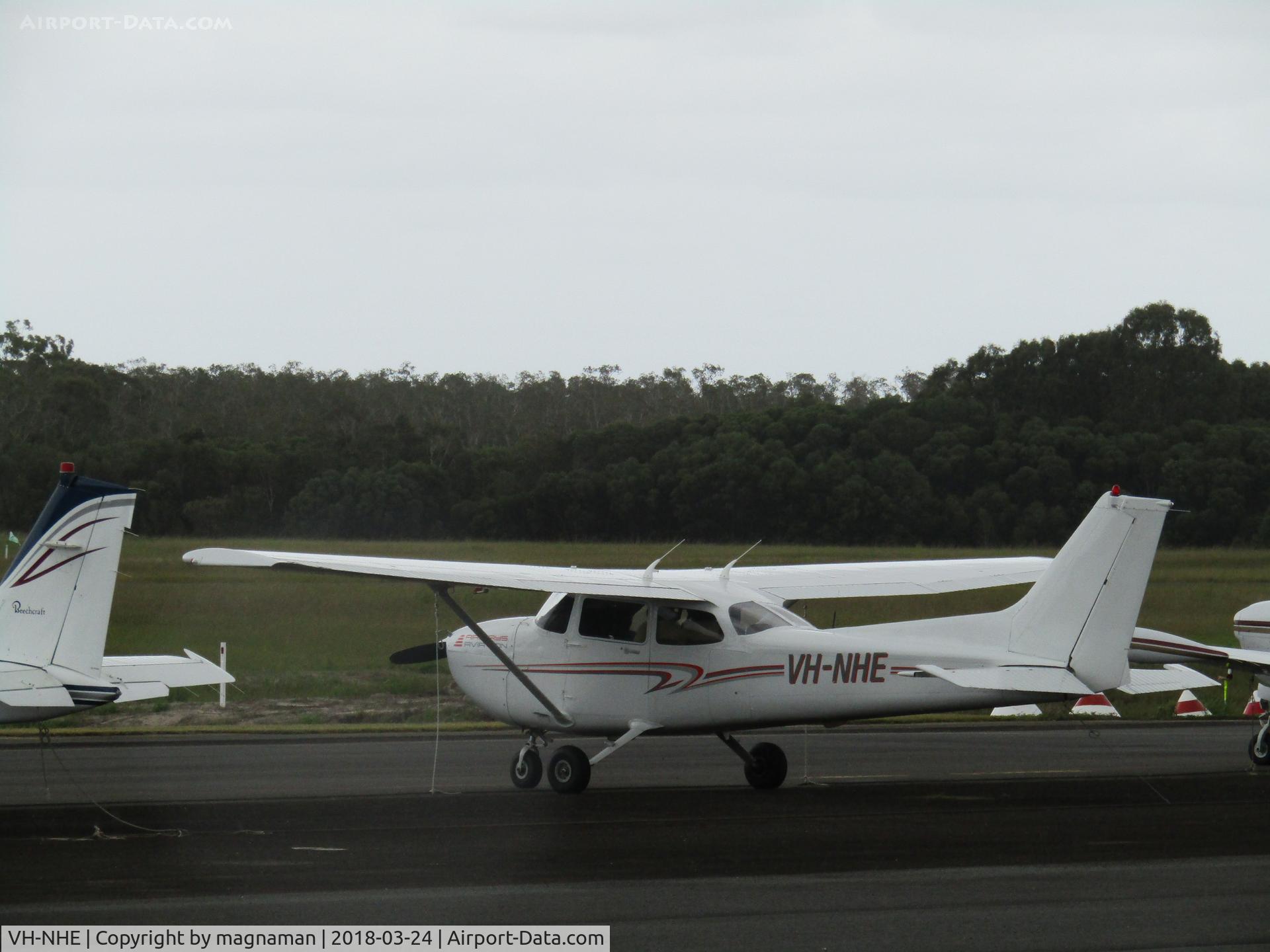 VH-NHE, Cessna 172 C/N 172-80920, on damp apron at Caloundra