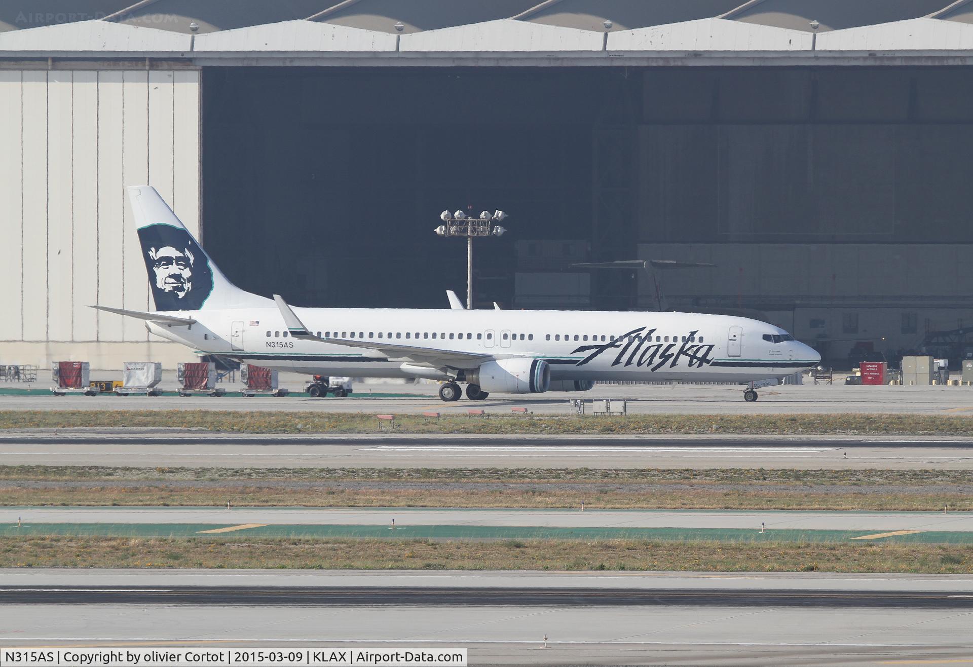 N315AS, 2002 Boeing 737-990 C/N 30019, taxiing at LAX
