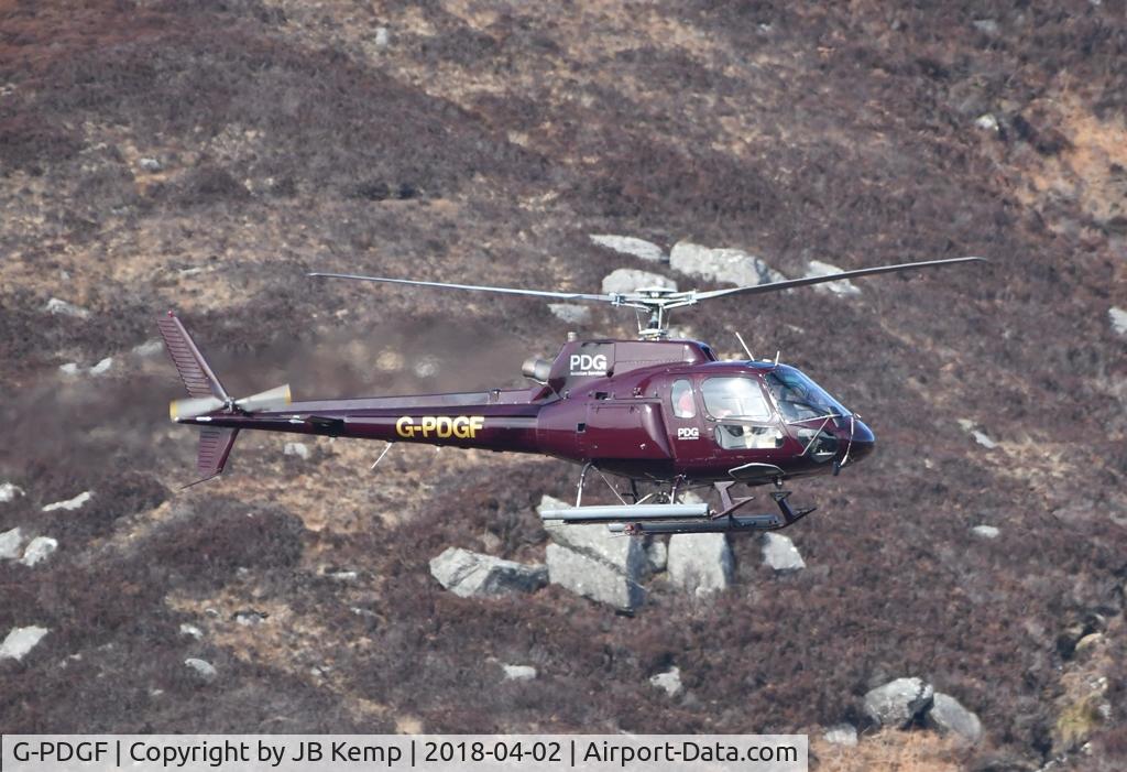 G-PDGF, 2000 Eurocopter AS-350B-2 Ecureuil Ecureuil C/N 9024, Flying low around hills of South Uist (Outer Hebrides) Monday 2nd April 2018