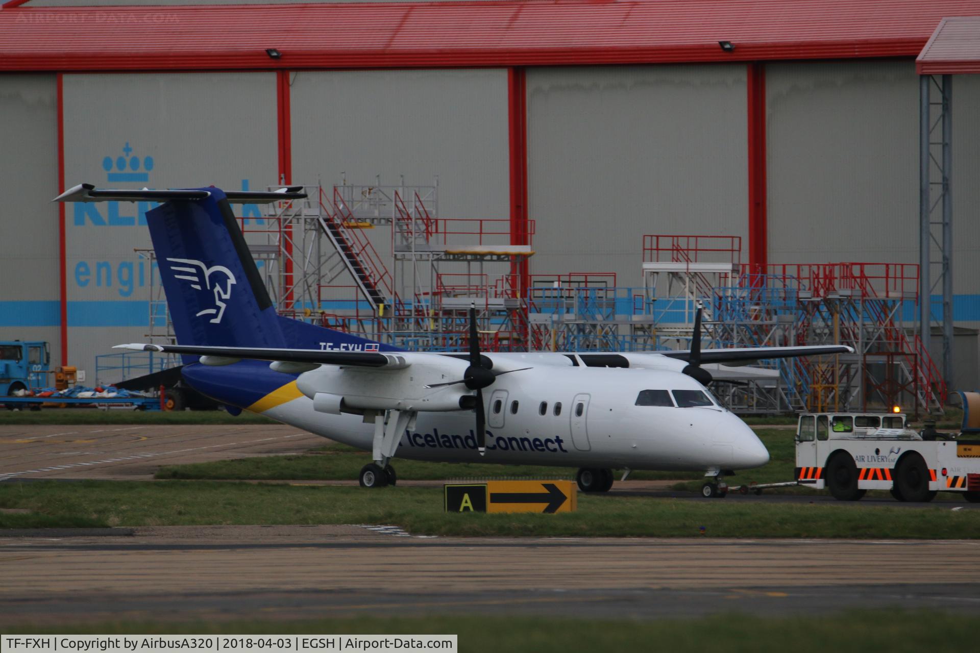 TF-FXH, 1997 De Havilland Canada DHC-8-202 Dash 8 C/N 450, seen being towed following repaint into Air iceland Connect livery