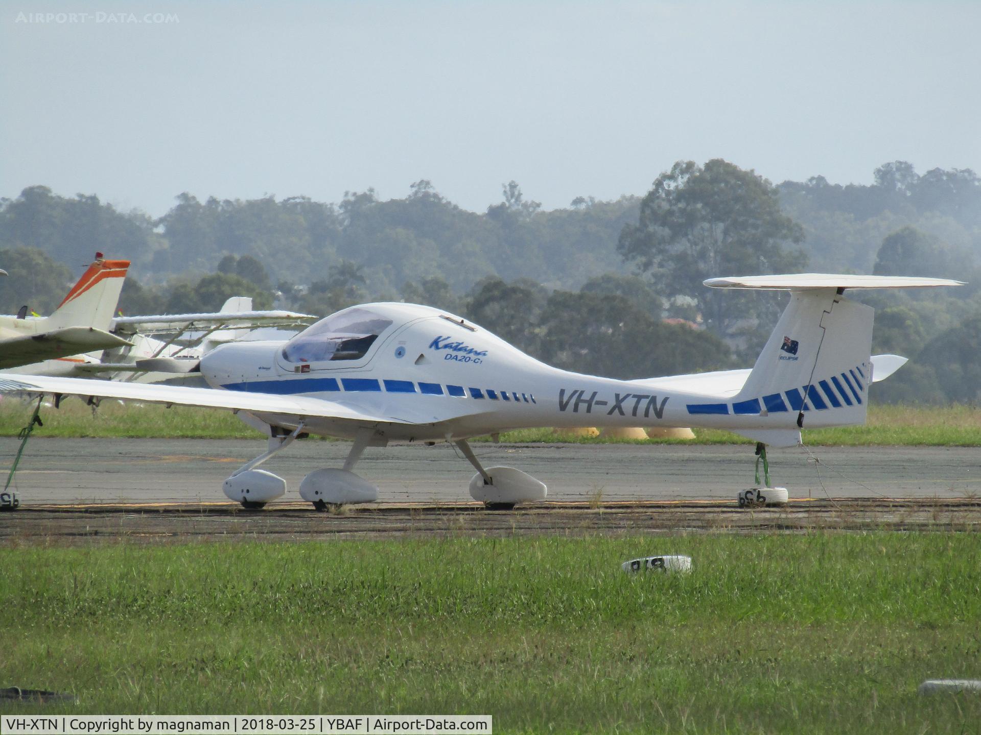 VH-XTN, 1990 Diamond DA-20-C1 Eclipse C/N C00054, on one of many busy aprons at archerfield