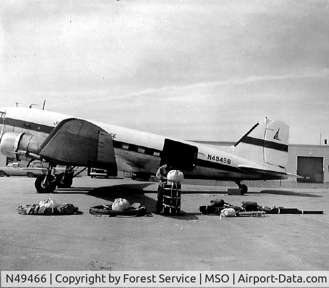 N49466, 1944 Douglas DC-3C C/N 15260, DC3 being loaded with cable for Moose Creek bridge project