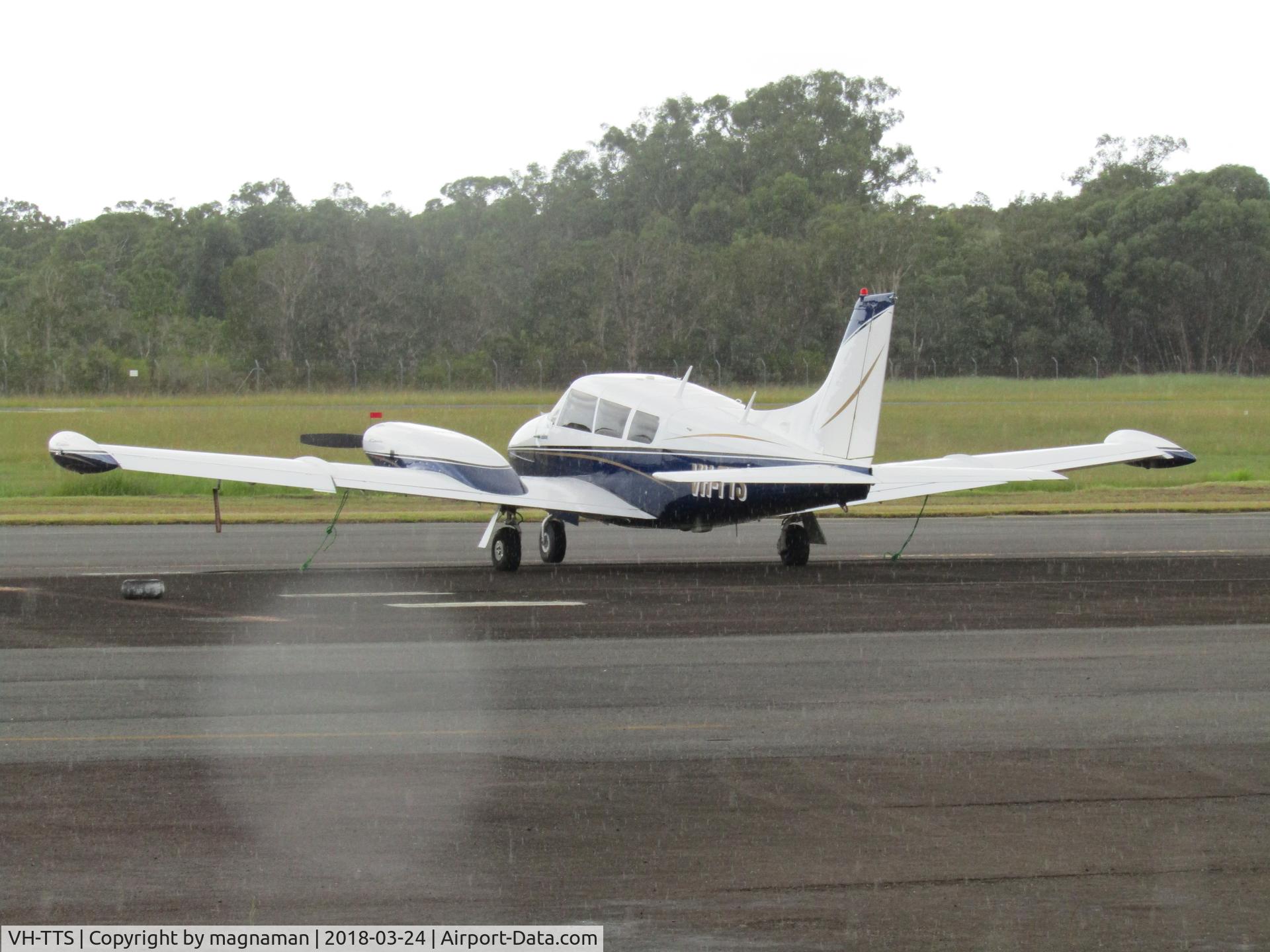 VH-TTS, 1969 Piper PA-30 Twin Comanche Twin Comanche C/N 30-1913, in rain at caloundra