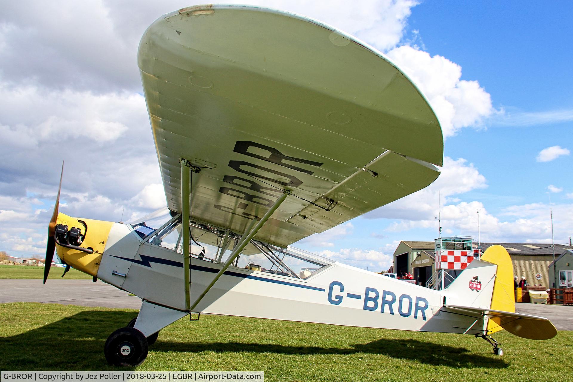 G-BROR, 1943 Piper L-4H Grasshopper (J3C-65D) C/N 10885, sat in sunshine outside clubhouse