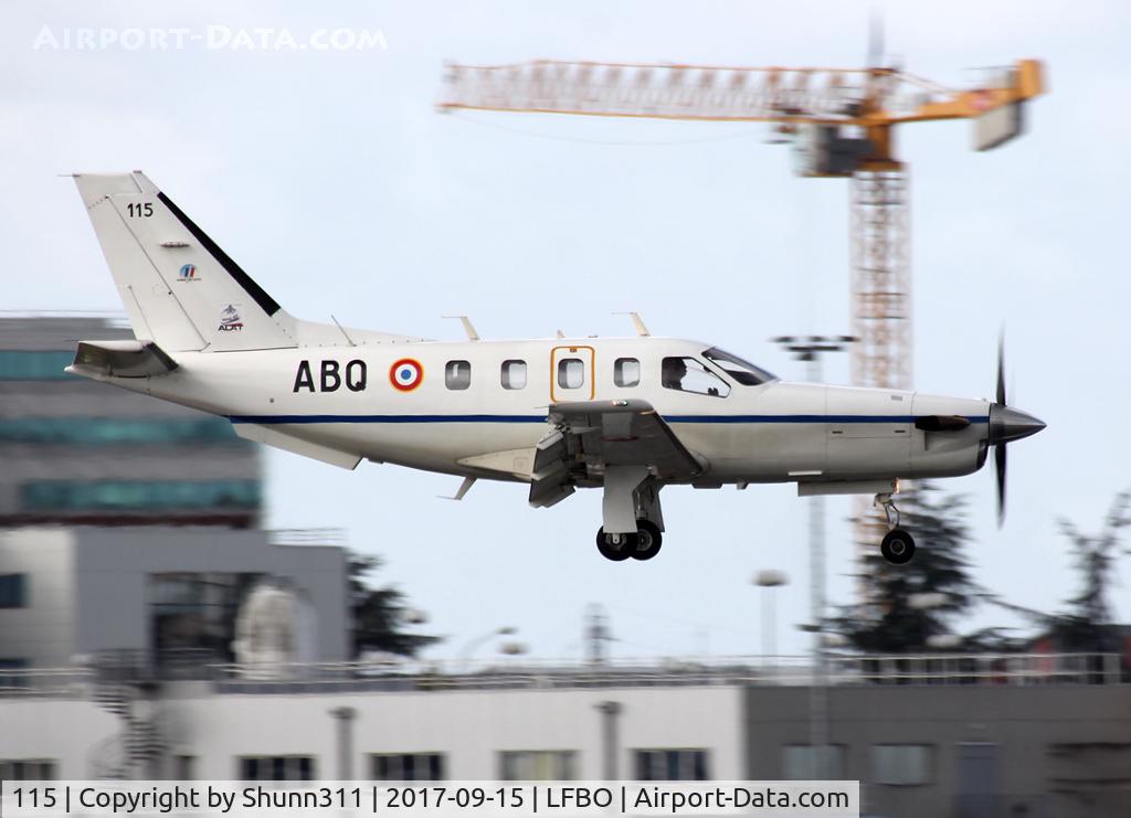115, Socata TBM-700 C/N 115, Landing rwy 32R with additional stickers