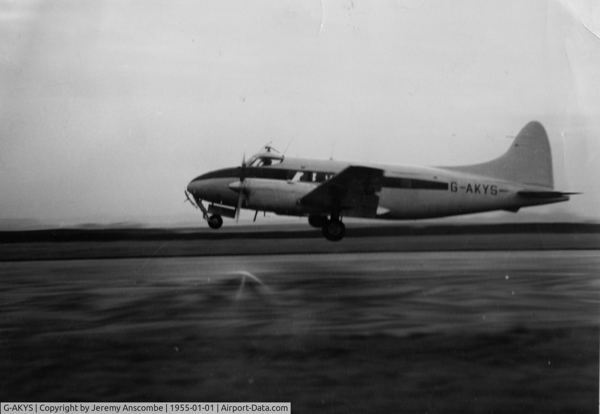 G-AKYS, De Havilland DH-104 Dove 2B C/N 04135, My father Philip Anscombe is the pilot with David Brown (the DB in Aston Martin) as passenger.
Taken ~1955, David Brown's airfield, Huddersfield.