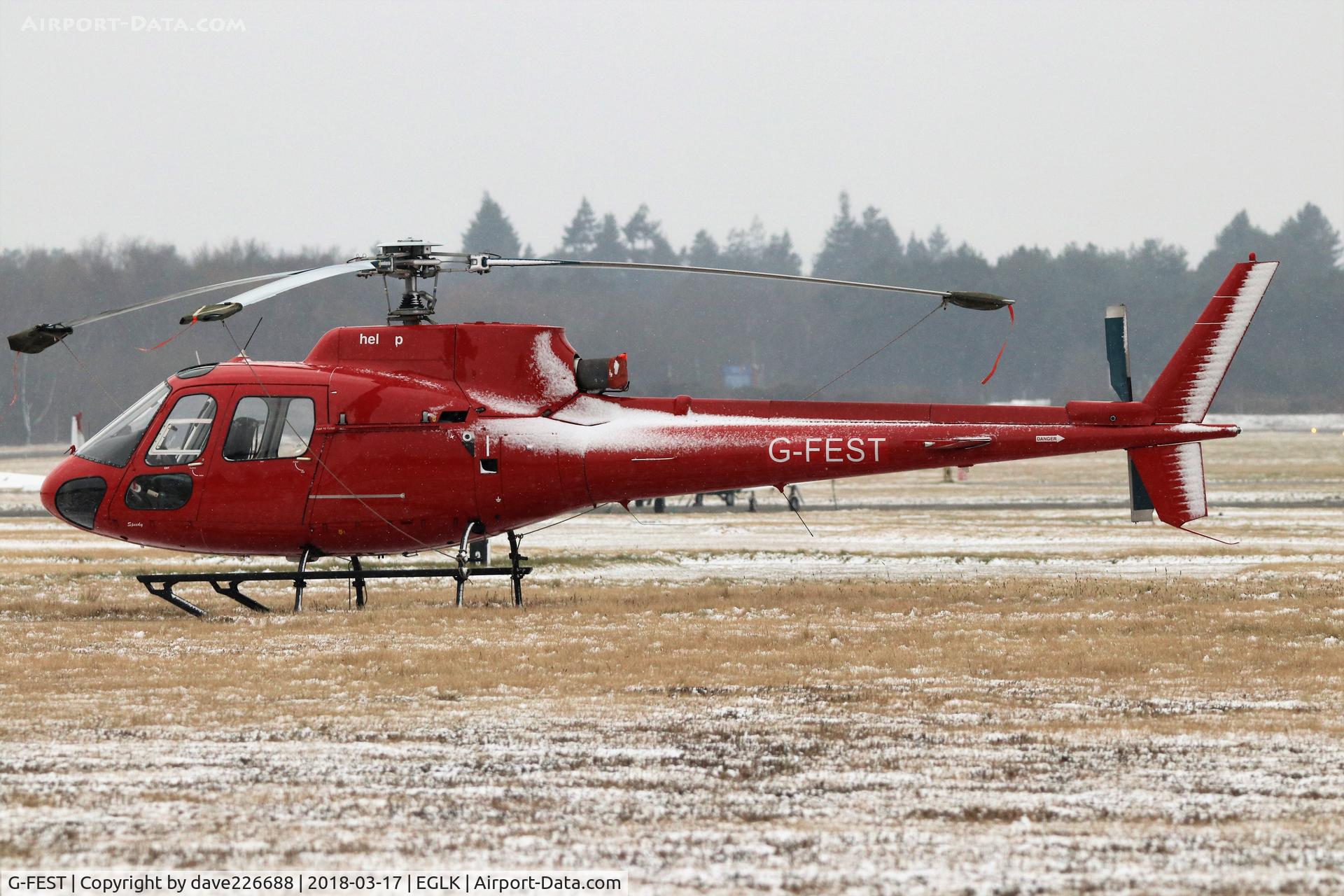 G-FEST, 1988 Aerospatiale AS-350B Ecureuil C/N 2079, G Fest of Phoenix Helicopters looking a tad festive at a snowy Blackbushe