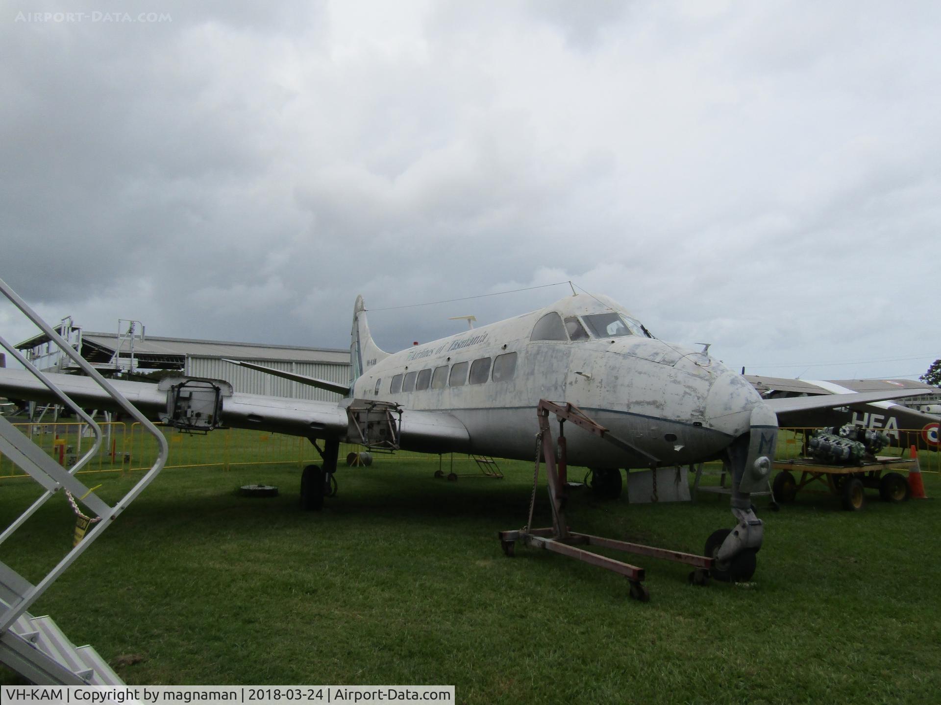 VH-KAM, 1957 De Havilland DH-114 Heron 2D C/N 14123, Just before rain came at Caloundra Musuem