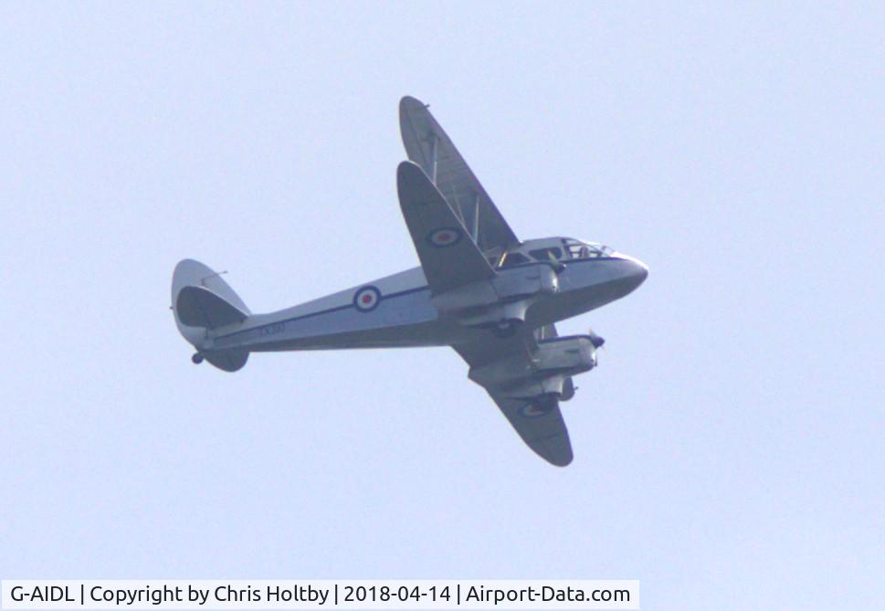 G-AIDL, 1946 De Havilland DH-89A Dominie/Dragon Rapide 6 C/N 6968, Still going strong over Rye Meads, Herts
