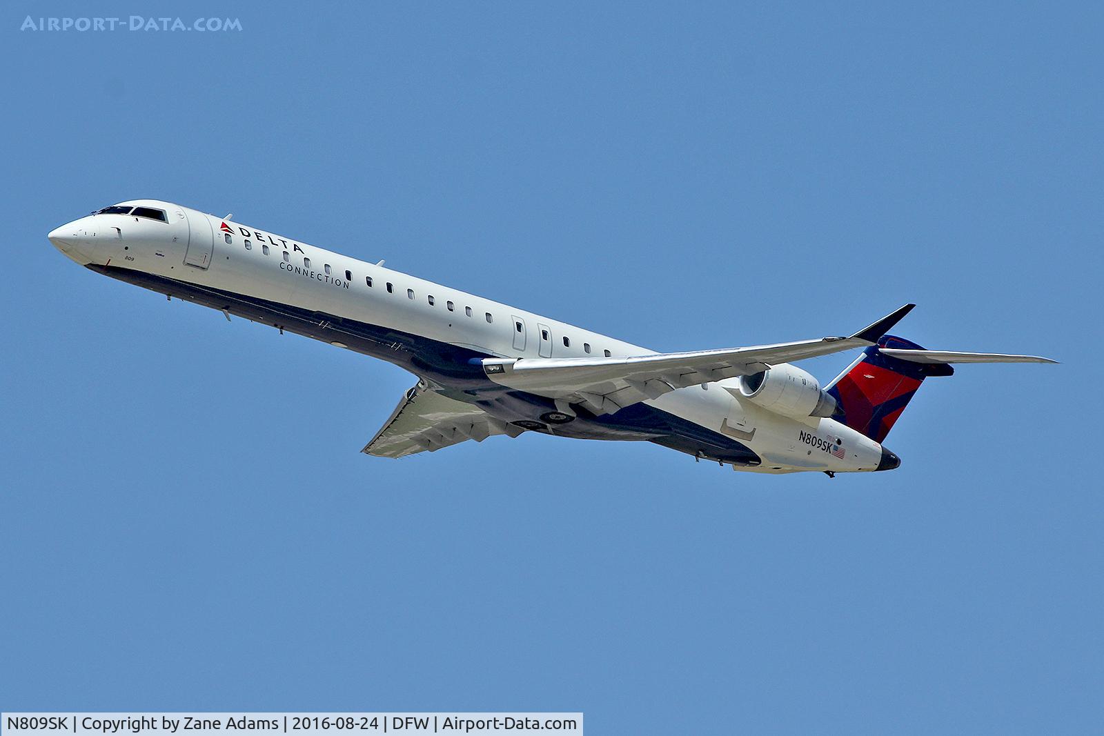 N809SK, 2006 Bombardier CRJ-900ER (CL-600-2D24) C/N 15086, Departing DFW Airport