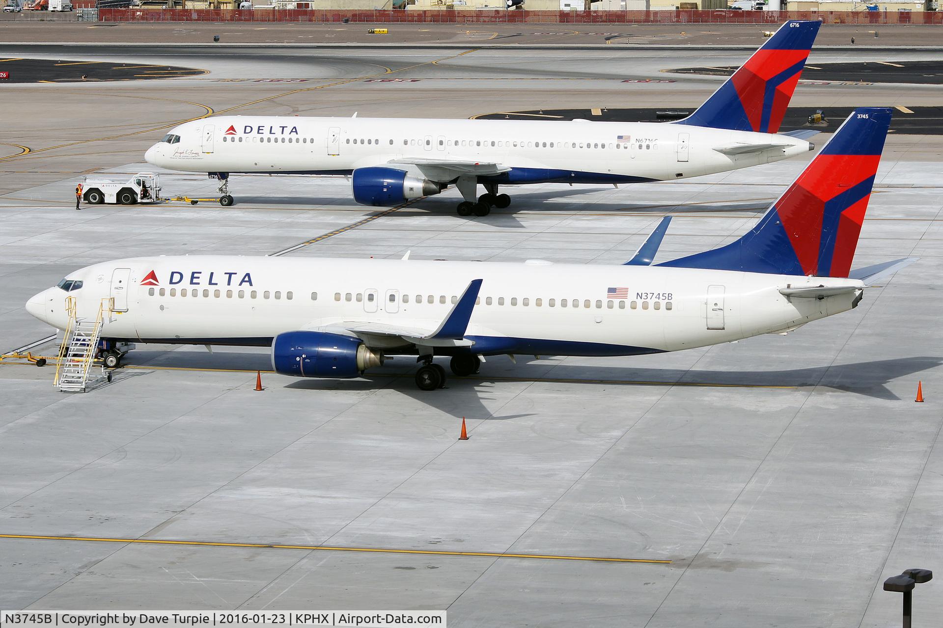 N3745B, 2001 Boeing 737-832 C/N 32373, That's N6716C in the background.