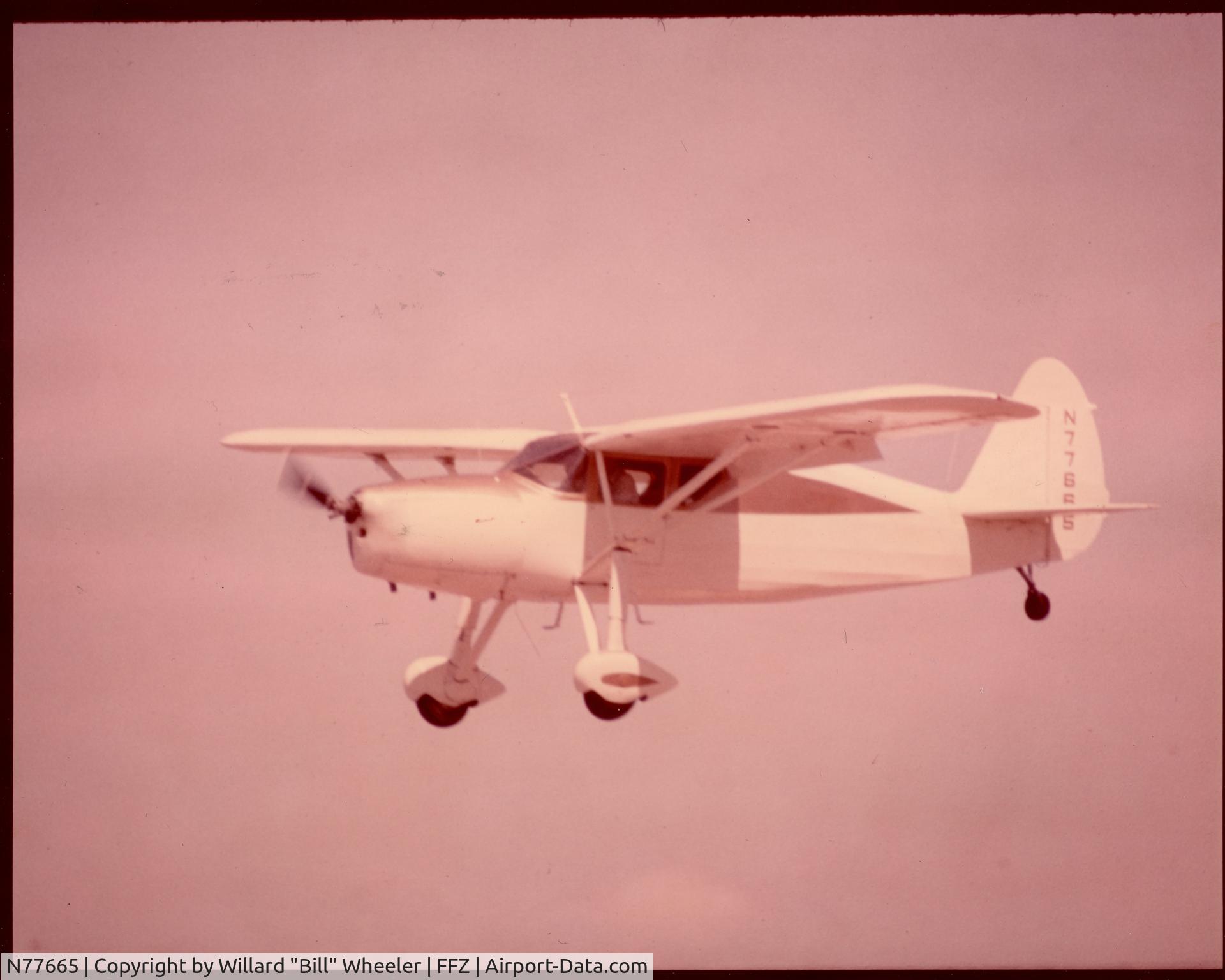 N77665, 1947 Fairchild 24R-46 C/N R46-365, This aircraft formerly belonged to Mr. Bob Wasson of Apache Junction, AZ. This photo was of the aircraft doing some pattern work at Falcon Field, Mesa, AZ, after Bob had done a full fabric recovering in the driveway of his house.