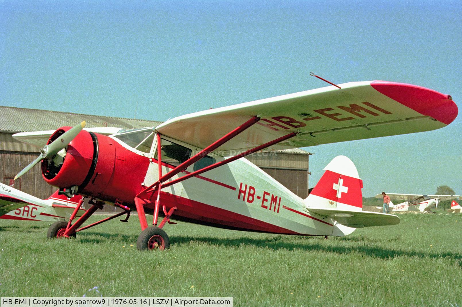 HB-EMI, 1943 Fairchild 24W-41A C/N 767, At Sitterdorf. One time it was all red.Scanned from a slide.