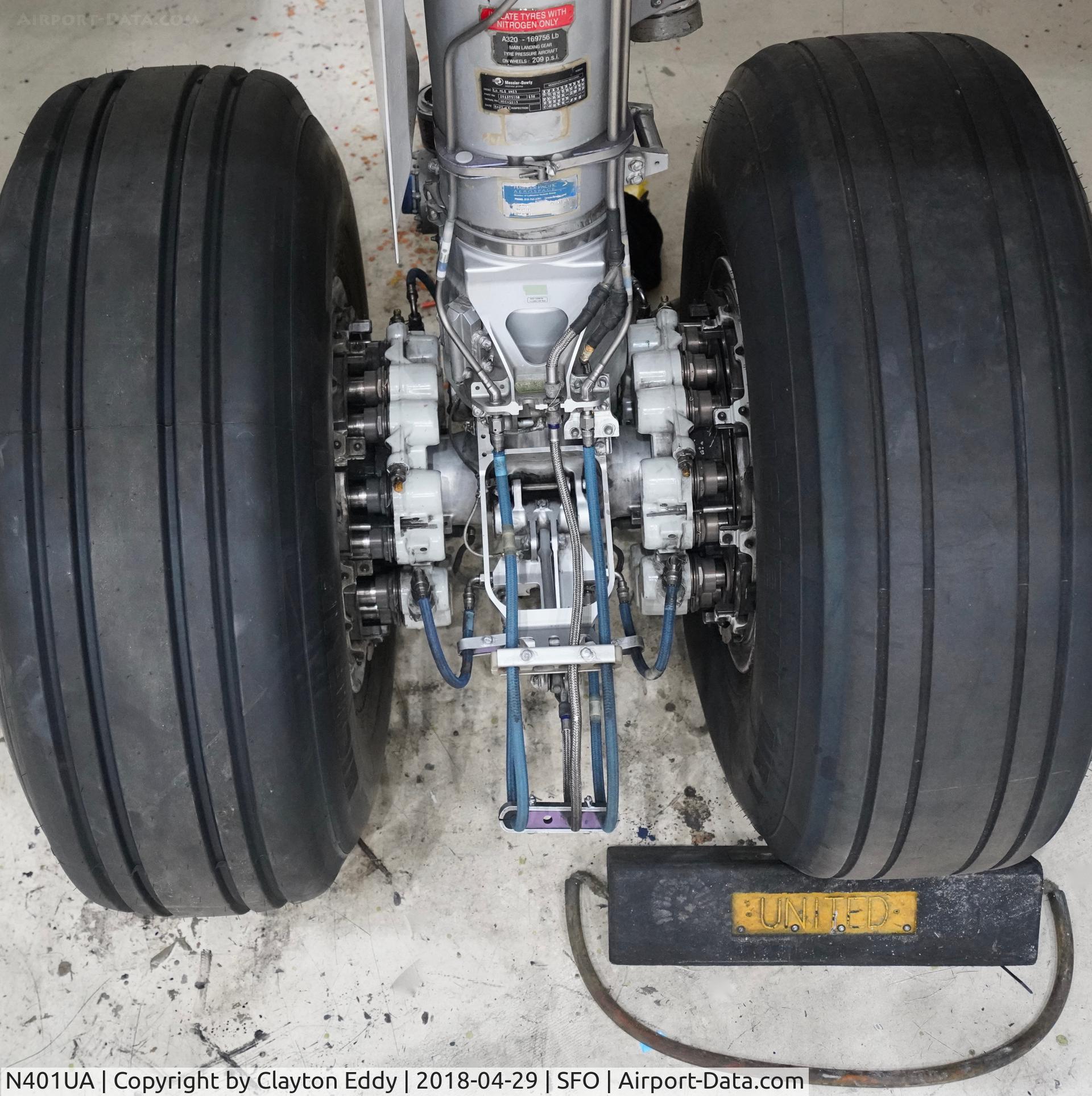 N401UA, 1993 Airbus A320-232 C/N 435, Main landing gear. SFO. 2018.