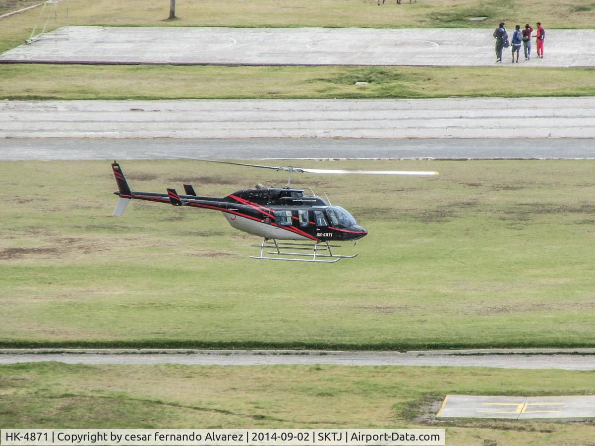 HK-4871, 1984 Bell 206L-3 LongRanger III C/N 51091, take off from helipad in the city of tunja