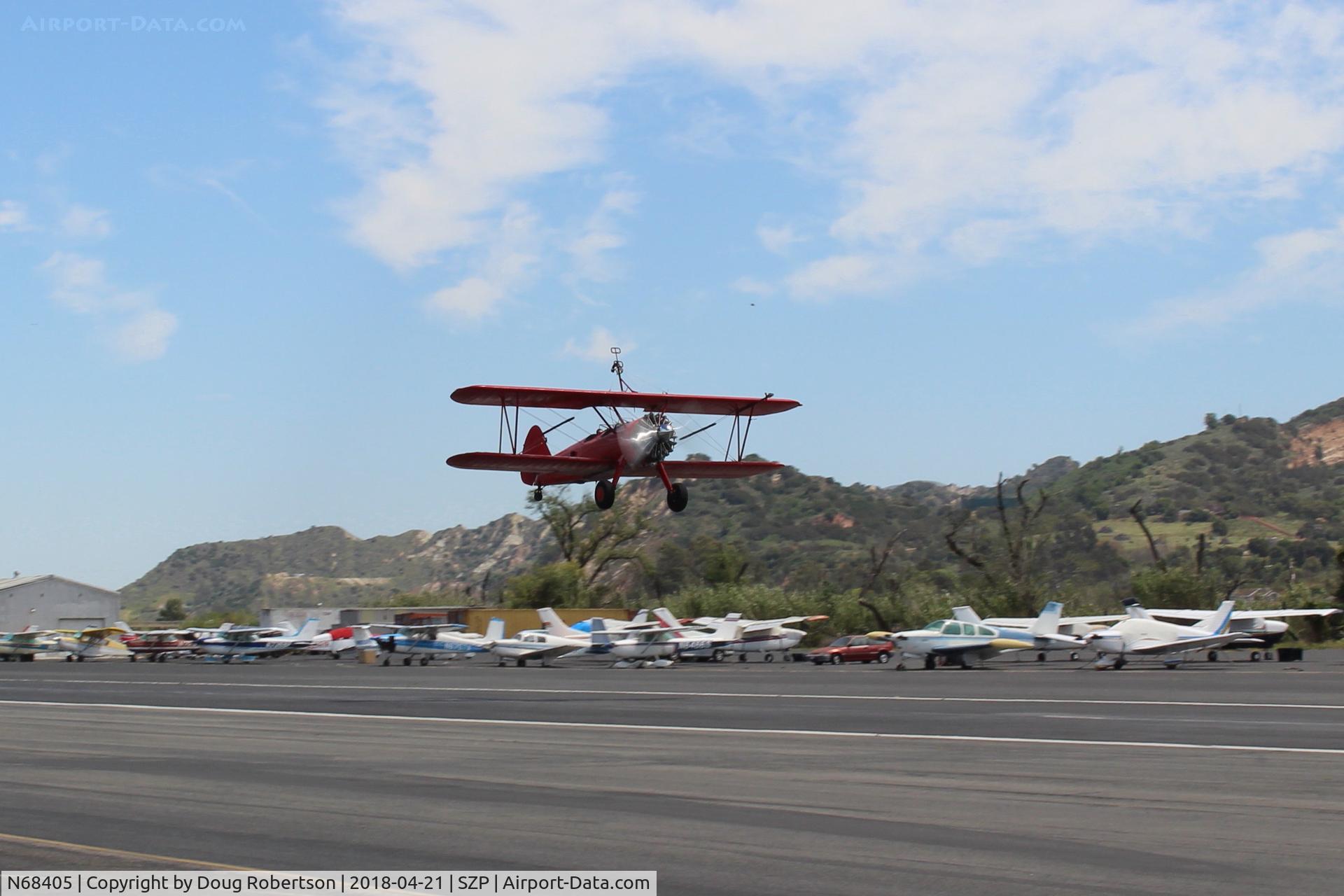 N68405, 1943 Boeing A75N1(PT17) C/N 75-7759, 1943 Boeing Stearman A75N1 (PT-17), P&W R985 Wasp Jr. 450 Hp upgrade, takeoff climb Rwy 22